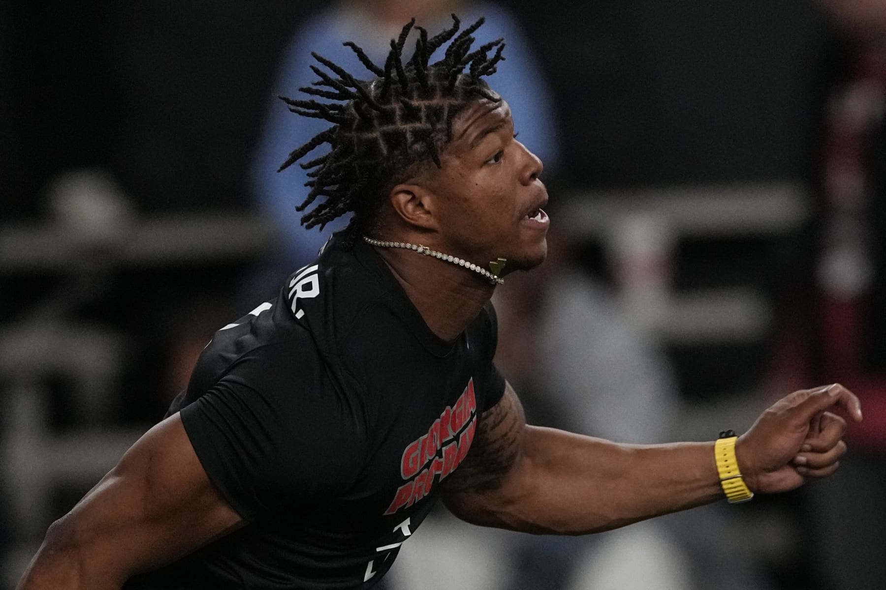 Former Georgia linebacker Nolan Smith runs football drills during Georgia's Pro Day, Wednesday, March 15, 2023, in Athens, Ga. (AP Photo/John Bazemore)
