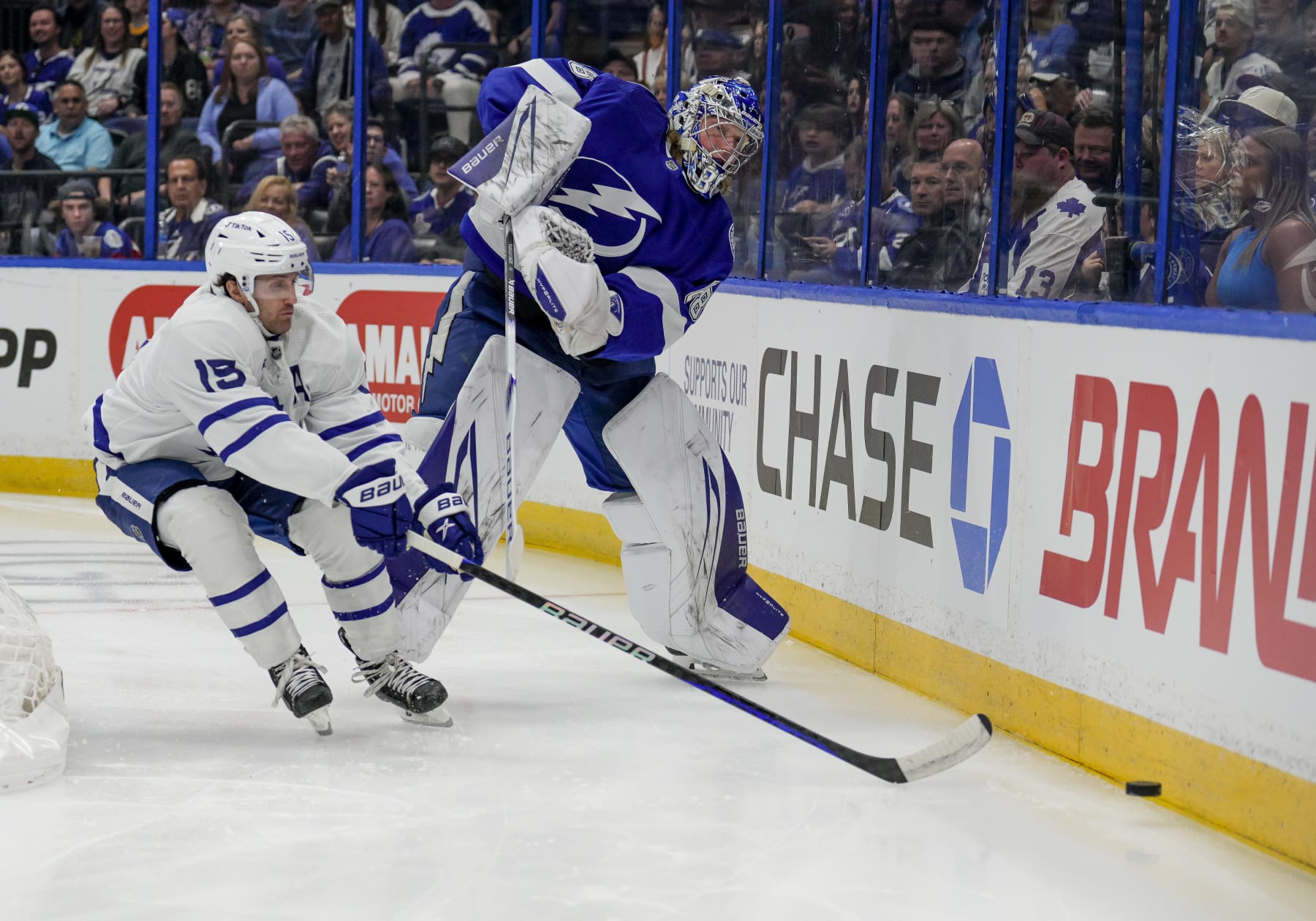 TAMPA, FL - APRIL 11:  Tampa Bay Lightning goaltender Andrei Vasilevskiy (88) and Toronto Maple Leafs center Alexander Kerfoot (15) behind the net during the NHL Hockey match between the Tampa Bay Lightning and Toronto Maple Leafs on April 11th 2023 at Amalie Arena in Tampa, FL. (Photo by Andrew Bershaw/Icon Sportswire via Getty Images)