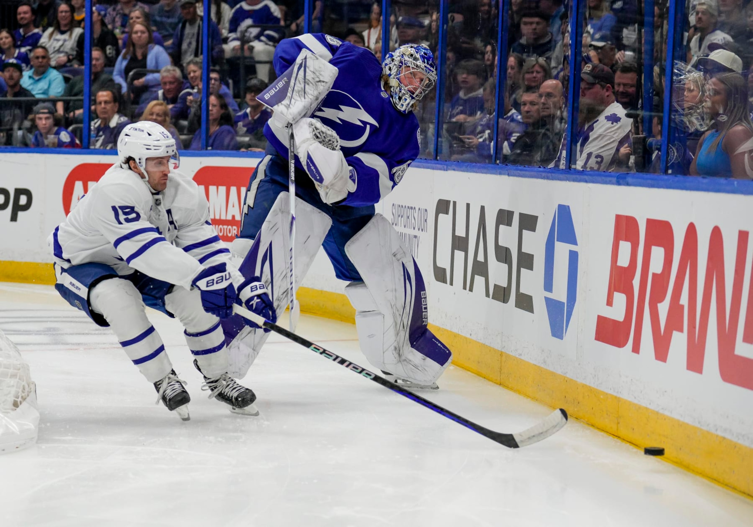 TAMPA, FL - APRIL 11:  Tampa Bay Lightning goaltender Andrei Vasilevskiy (88) and Toronto Maple Leafs center Alexander Kerfoot (15) behind the net during the NHL Hockey match between the Tampa Bay Lightning and Toronto Maple Leafs on April 11th 2023 at Amalie Arena in Tampa, FL. (Photo by Andrew Bershaw/Icon Sportswire via Getty Images)