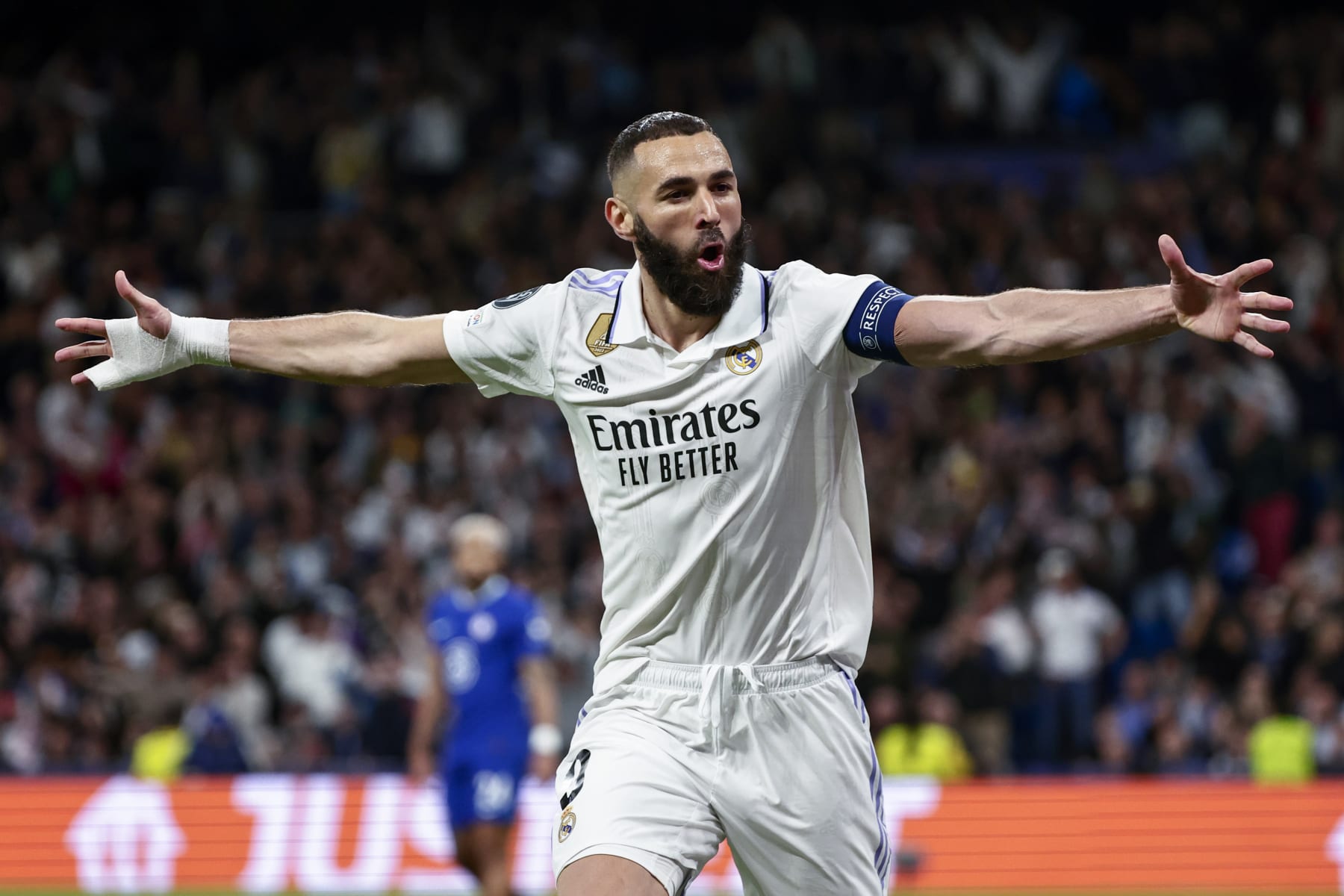 MADRID, SPAIN - APRIL 12: Karim Benzema of Real Madrid celebrates scoring their teams first goal with team mates during the UEFA Champions League quarterfinal first leg match between Real Madrid and Chelsea FC at Estadio Santiago Bernabeu on April 12, 2023 in Madrid, Spain (Photo by MB Media/Getty Images)