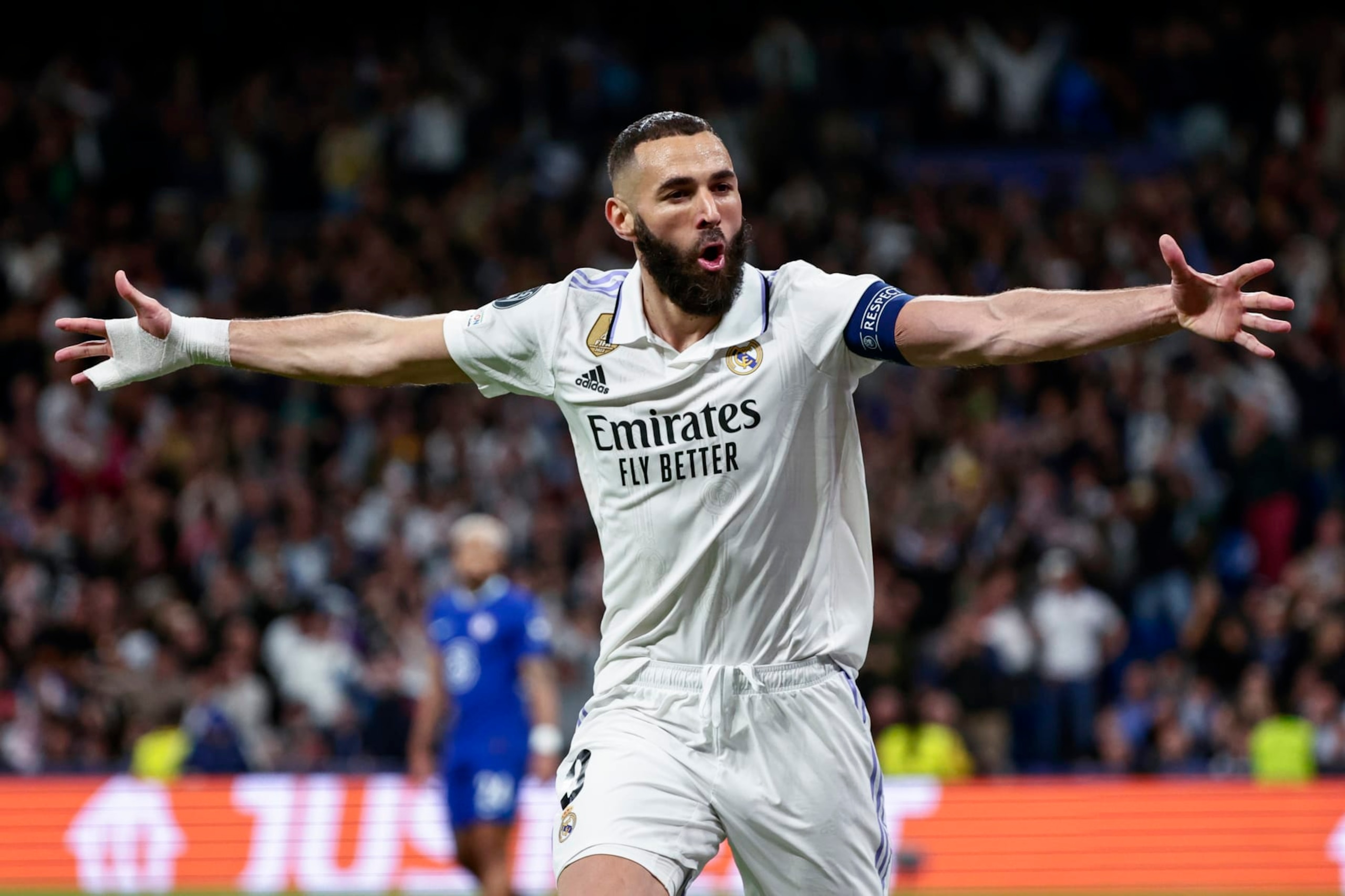 MADRID, SPAIN - APRIL 12: Karim Benzema of Real Madrid celebrates scoring their teams first goal with team mates during the UEFA Champions League quarterfinal first leg match between Real Madrid and Chelsea FC at Estadio Santiago Bernabeu on April 12, 2023 in Madrid, Spain (Photo by MB Media/Getty Images)