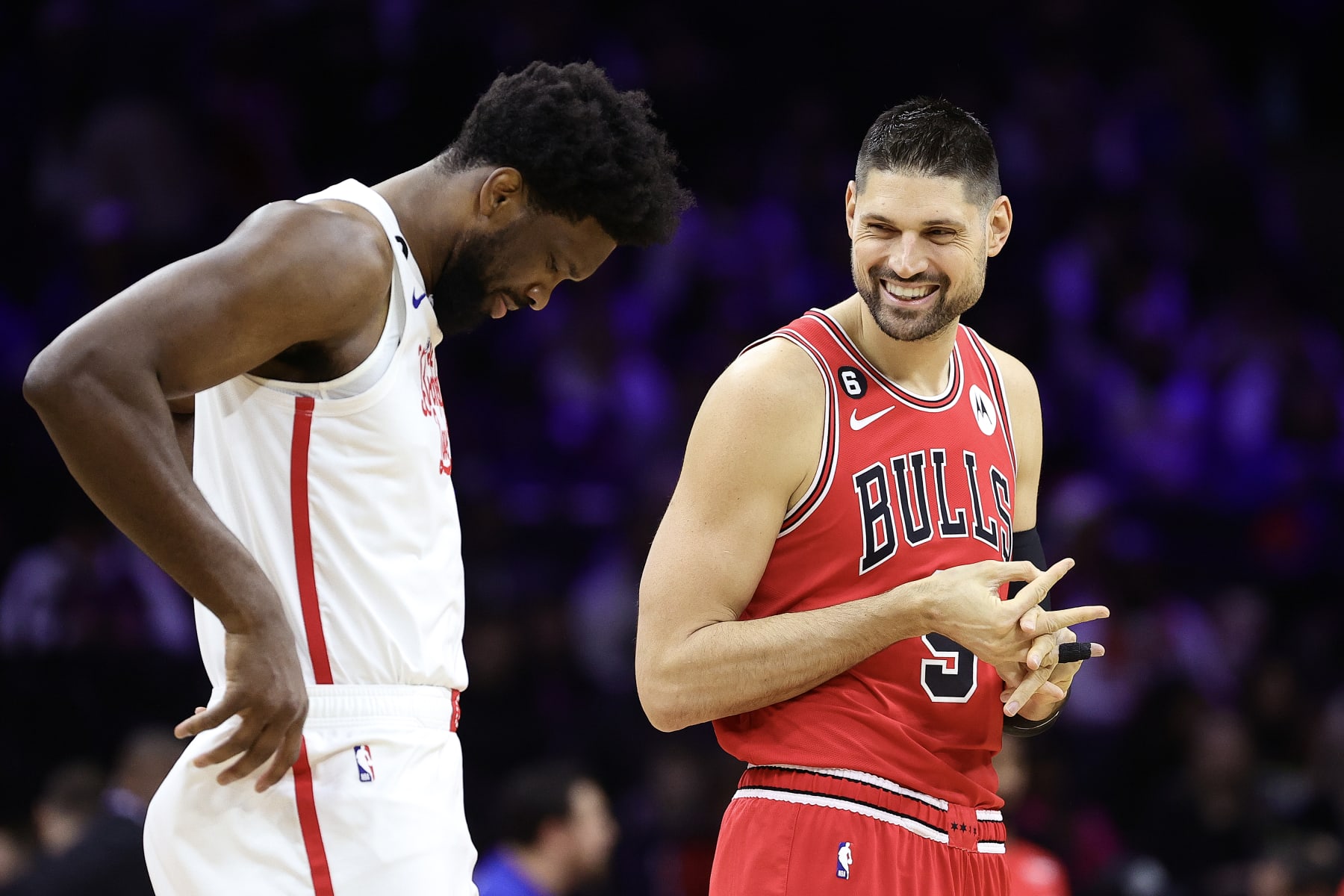 PHILADELPHIA, PENNSYLVANIA - MARCH 20: Joel Embiid #21 of the Philadelphia 76ers and Nikola Vucevic #9 of the Chicago Bulls react during the first quarter at Wells Fargo Center on March 20, 2023 in Philadelphia, Pennsylvania. NOTE TO USER: User expressly acknowledges and agrees that, by downloading and or using this photograph, User is consenting to the terms and conditions of the Getty Images License Agreement. (Photo by Tim Nwachukwu/Getty Images) (Photo by Tim Nwachukwu/Getty Images)