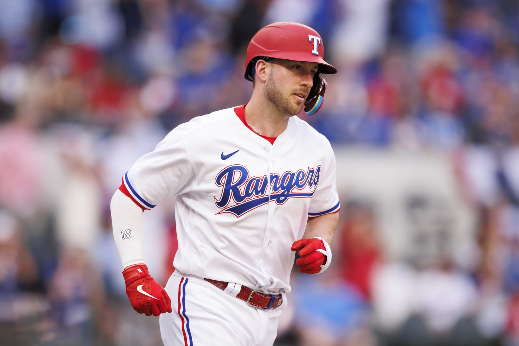 ARLINGTON, TX - APRIL 01: Mitch Garver #18 of the Texas Rangers rounds the bases after he hits his second three-run home run of the day during a game against the Philadelphia Phillies at Globe Life Field on April 1, 2023 in Arlington, Texas. (Photo by Bailey Orr/Texas Rangers/Getty Images)