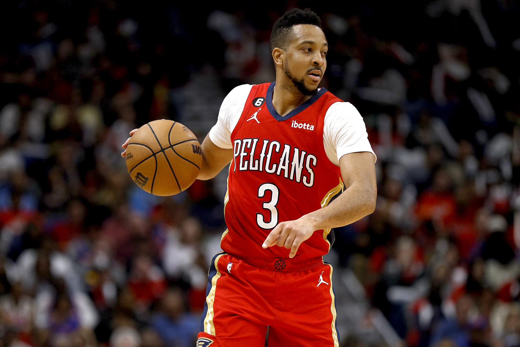 NEW ORLEANS, LOUISIANA - APRIL 07: CJ McCollum #3 of the New Orleans Pelicans dribbles the ball down court during the fourth quarter of an NBA game against the New York Knicks at Smoothie King Center on April 07, 2023 in New Orleans, Louisiana. NOTE TO USER: User expressly acknowledges and agrees that, by downloading and or using this photograph, User is consenting to the terms and conditions of the Getty Images License Agreement. (Photo by Sean Gardner/Getty Images)