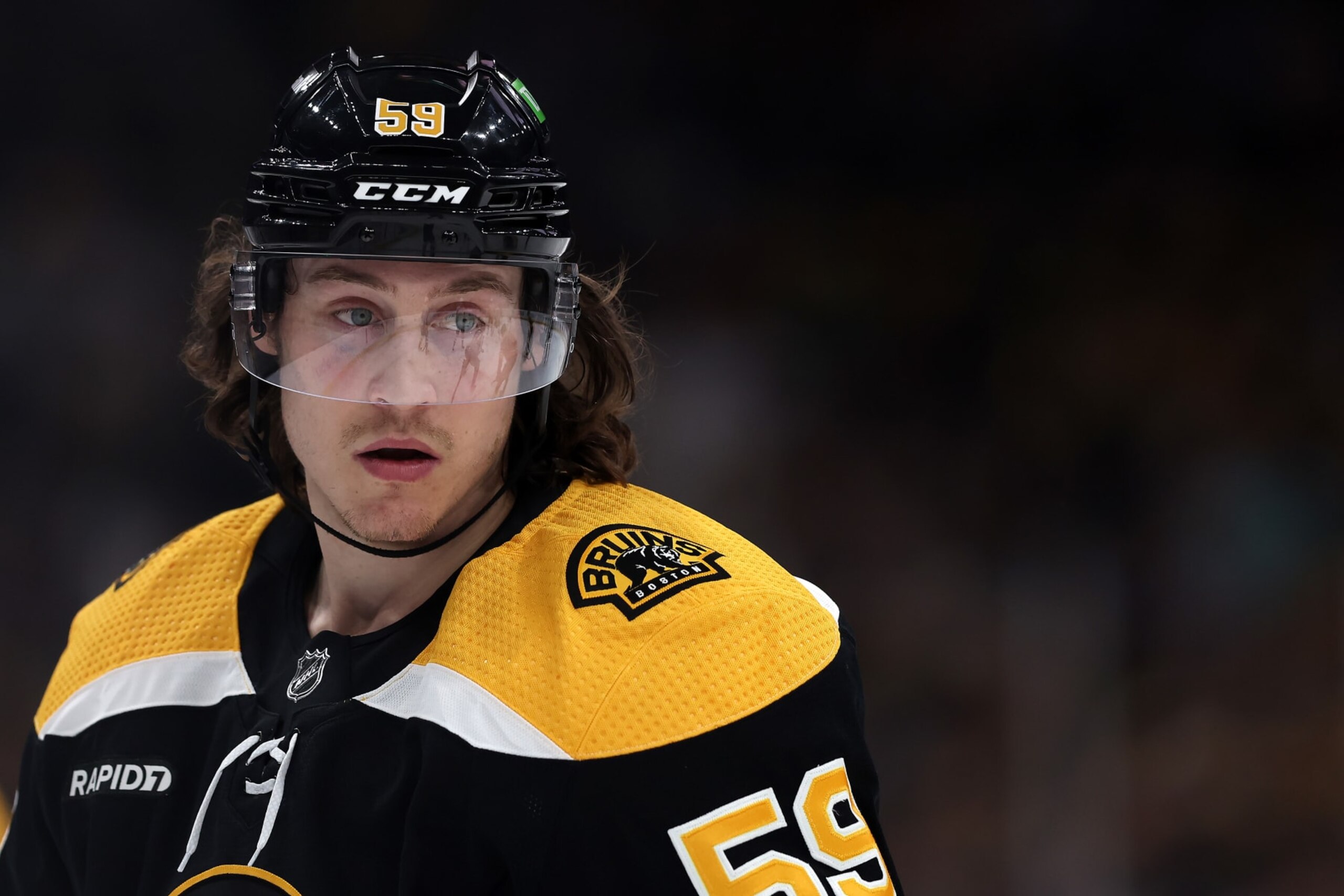 BOSTON, MASSACHUSETTS - APRIL 11: Tyler Bertuzzi #59 of the Boston Bruins looks on during the first period against the Washington Capitals  at TD Garden on April 11, 2023 in Boston, Massachusetts. (Photo by Maddie Meyer/Getty Images)