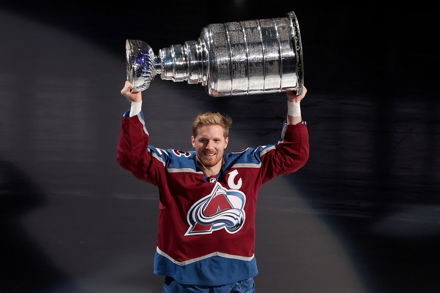 DENVER, COLORADO - OCTOBER 12: Gabriel Landeskog #92 of the Colorado Avalanche skates with the Stanley Cup at a ceremony celebrating last season's NHL championship before the home opener against the Chicago Blackhawks at Ball Arena on October 12, 2022 in Denver, Colorado. (Photo by Matthew Stockman/Getty Images)
