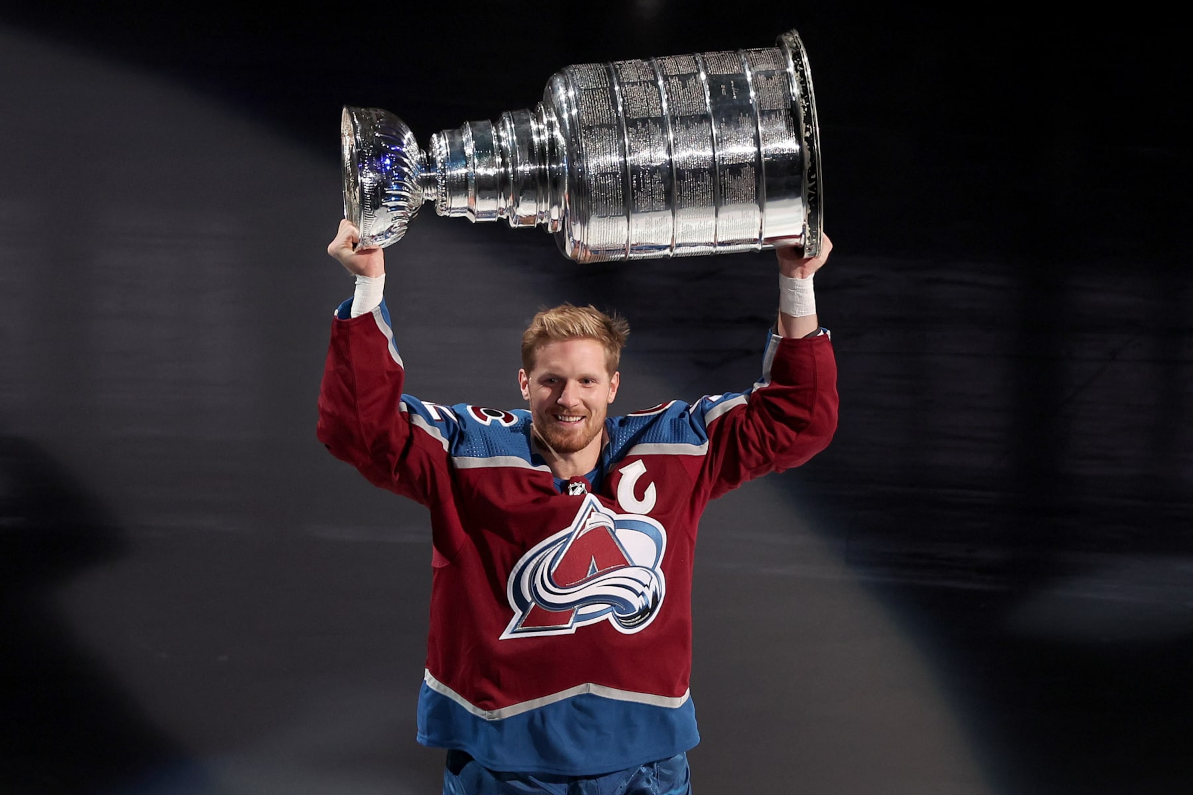 DENVER, COLORADO - OCTOBER 12: Gabriel Landeskog #92 of the Colorado Avalanche skates with the Stanley Cup at a ceremony celebrating last season's NHL championship before the home opener against the Chicago Blackhawks at Ball Arena on October 12, 2022 in Denver, Colorado. (Photo by Matthew Stockman/Getty Images) DENVER, COLORADO - OCTOBER 12: Gabriel Landeskog #92 of the Colorado Avalanche skates with the Stanley Cup at a ceremony celebrating last season's NHL championship before the home opener against the Chicago Blackhawks at Ball Arena on October 12, 2022 in Denver, Colorado. (Photo by Matthew Stockman/Getty Images)