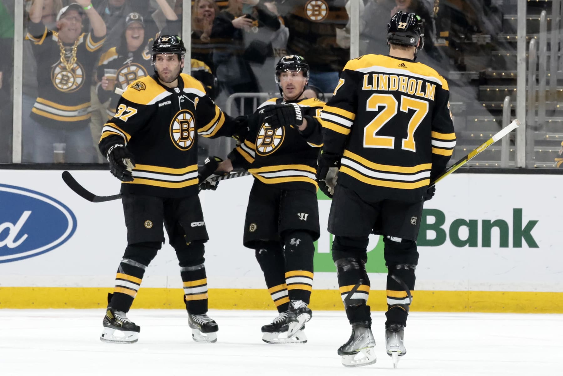 BOSTON, MA - APRIL 11: Boston Bruins left wing Brad Marchand (63) points out Boston Bruins right wing David Pastrnak (88) after scoring the opening goal during a game between the Boston Bruins and the Washington Capitals on April 11, 2023, at TD Garden in Boston, Massachusetts. (Photo by Fred Kfoury III/Icon Sportswire via Getty Images)
