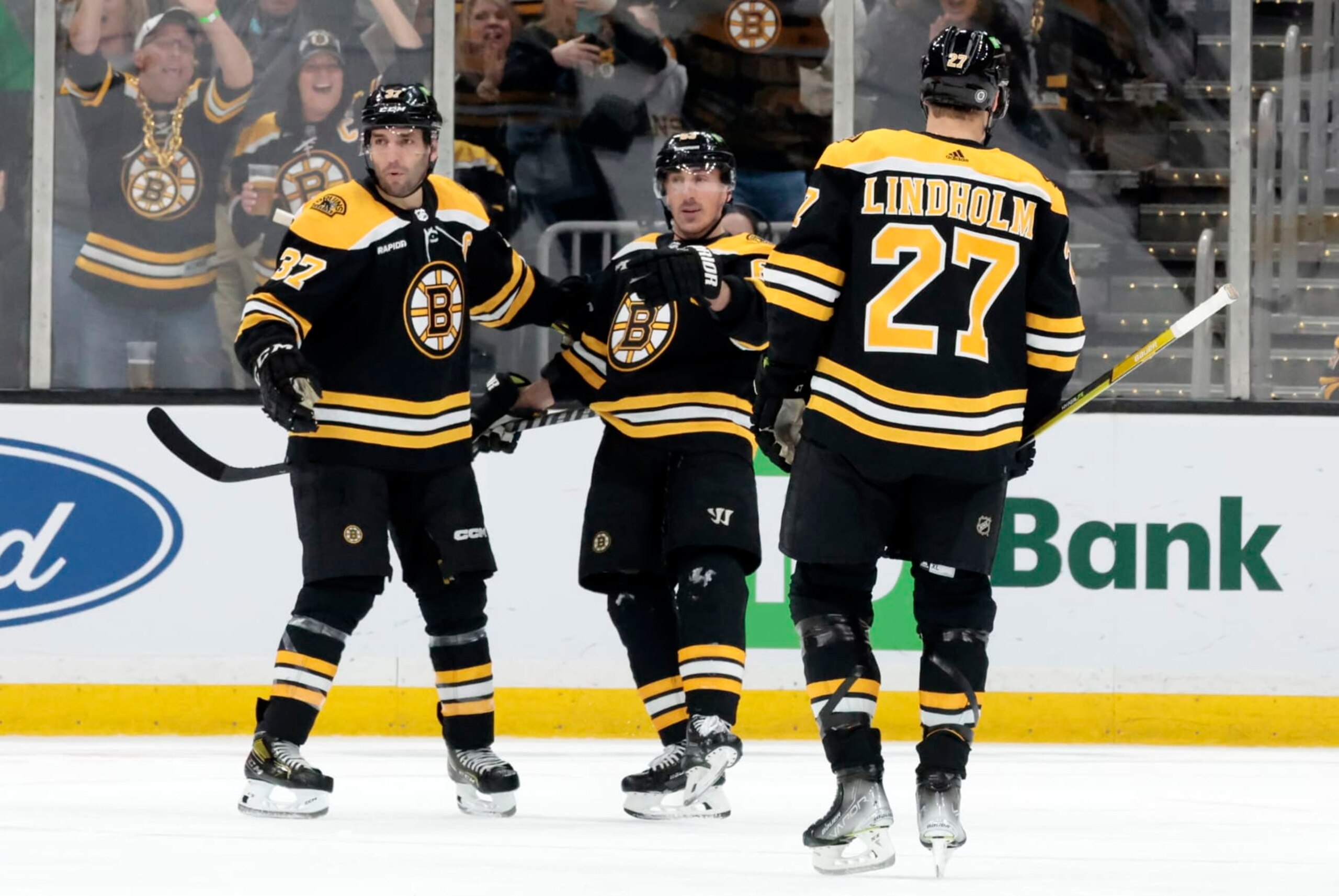 BOSTON, MA - APRIL 11: Boston Bruins left wing Brad Marchand (63) points out Boston Bruins right wing David Pastrnak (88) after scoring the opening goal during a game between the Boston Bruins and the Washington Capitals on April 11, 2023, at TD Garden in Boston, Massachusetts. (Photo by Fred Kfoury III/Icon Sportswire via Getty Images)