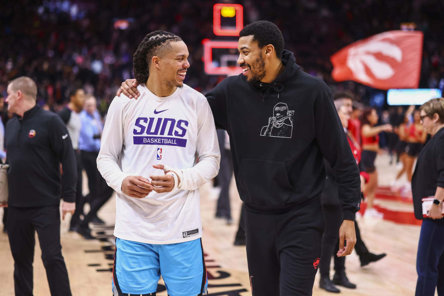 TORONTO, CANADA - DECEMBER 30: Damion Lee #10 of the Phoenix Suns talks with Otto Porter Jr. #32 of the Toronto Raptors after the game on December 30, 2022 at the Scotiabank Arena in Toronto, Ontario, Canada.  NOTE TO USER: User expressly acknowledges and agrees that, by downloading and or using this Photograph, user is consenting to the terms and conditions of the Getty Images License Agreement.  Mandatory Copyright Notice: Copyright 2022 NBAE (Photo by Vaughn Ridley/NBAE via Getty Images)