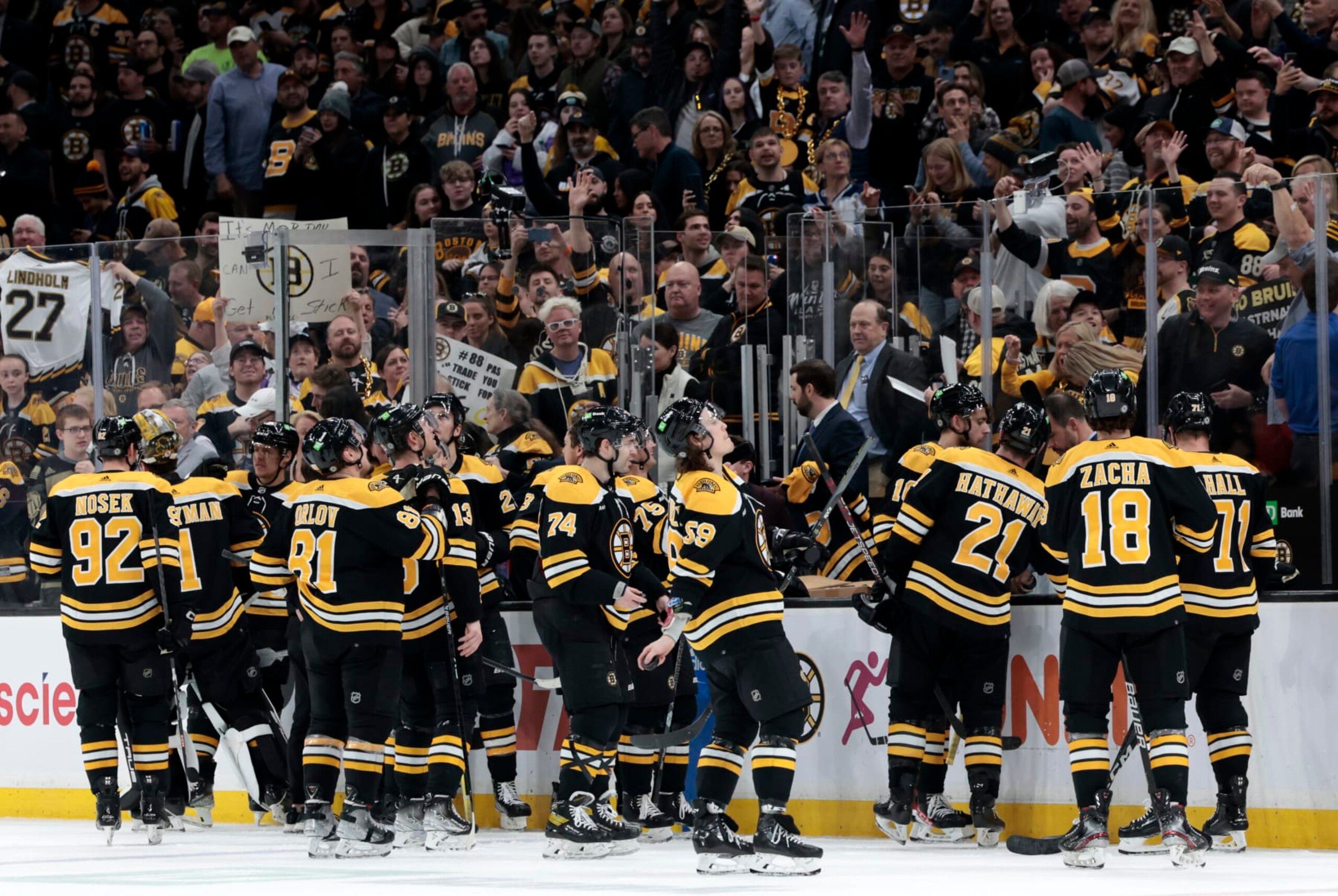 BOSTON, MA - APRIL 11: The Bruins toss pucks to the fans after a game between the Boston Bruins and the Washington Capitals on April 11, 2023, at TD Garden in Boston, Massachusetts. (Photo by Fred Kfoury III/Icon Sportswire via Getty Images) BOSTON, MA - APRIL 11: The Bruins toss pucks to the fans after a game between the Boston Bruins and the Washington Capitals on April 11, 2023, at TD Garden in Boston, Massachusetts. (Photo by Fred Kfoury III/Icon Sportswire via Getty Images)