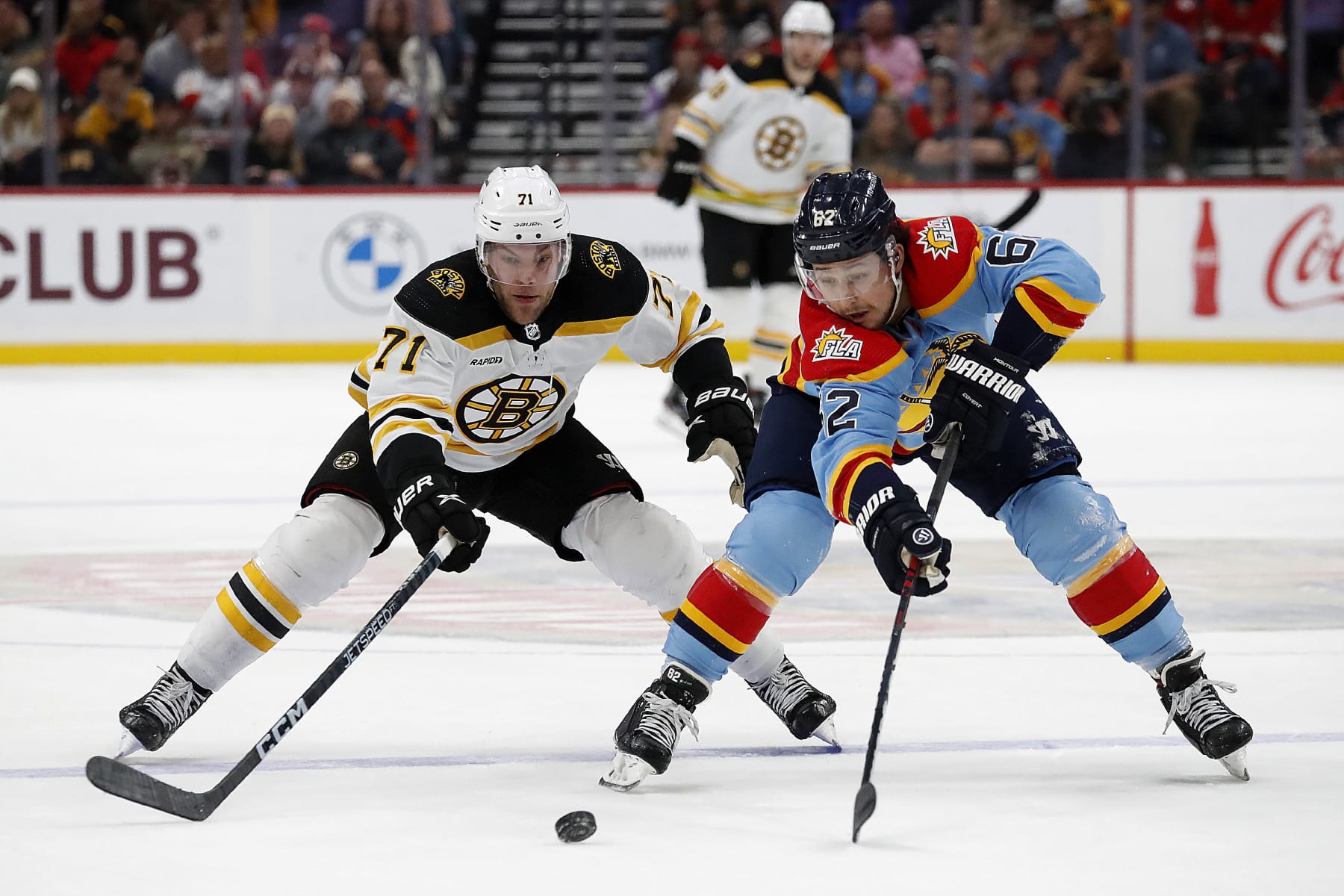 Boston's Taylor Hall and Florida's Brandon Montour