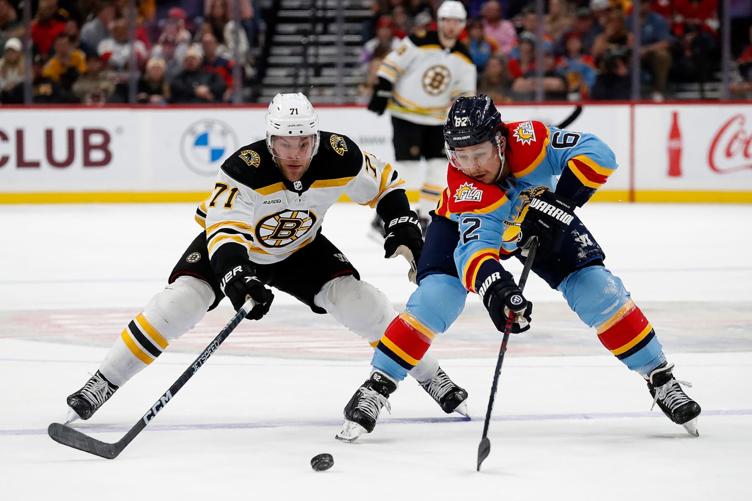 Boston's Taylor Hall and Florida's Brandon Montour