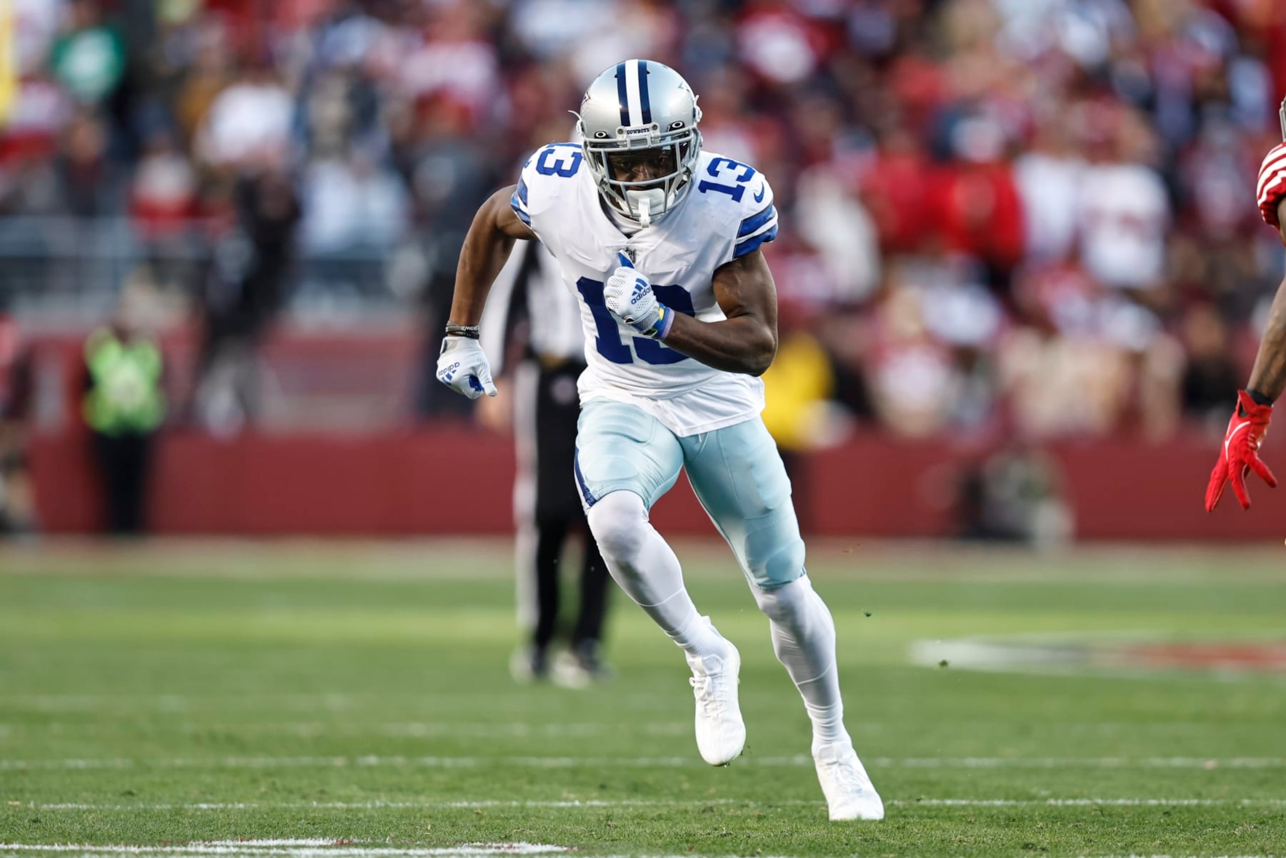 SANTA CLARA, CALIFORNIA - JANUARY 22: Michael Gallup #13 of the Dallas Cowboys runs during an NFL divisional round playoff football game between the San Francisco 49ers and the Dallas Cowboys at Levi's Stadium on January 22, 2023 in Santa Clara, California. (Photo by Michael Owens/Getty Images)