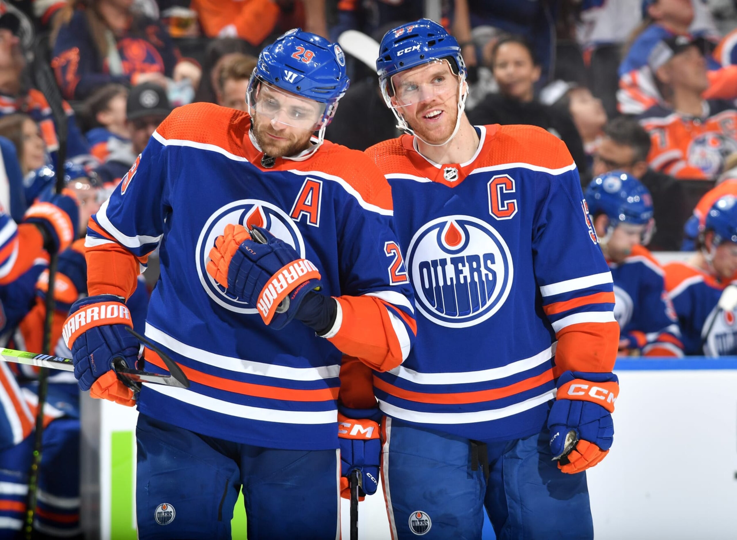 EDMONTON, CANADA - APRIL 01: Connor McDavid #97 and Leon Draisaitl #29 of the Edmonton Oilers have a conversation while awaiting a face-off during the game against the Anaheim Ducks on April 1, 2023 at Rogers Place in Edmonton, Alberta, Canada. (Photo by Andy Devlin/NHLI via Getty Images)