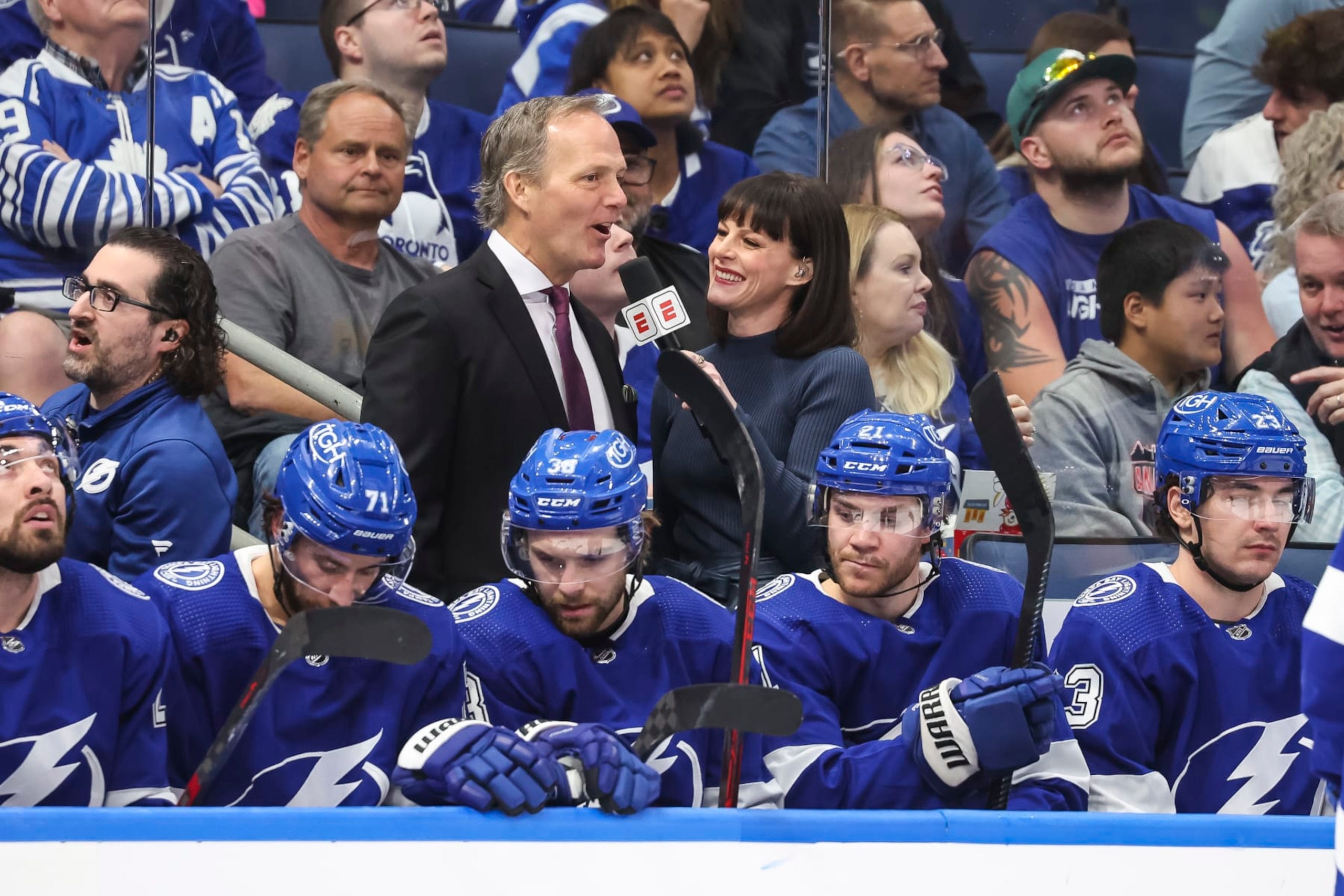 TAMPA, FL - APRIL 11: Head coach Jon Cooper of the Tampa Bay Lightning during an interview with Leah Hextall against the Toronto Maple Leafs during the second period at Amalie Arena on April 11, 2023 in Tampa, Florida. (Photo by Mark LoMoglio/NHLI via Getty Images)
