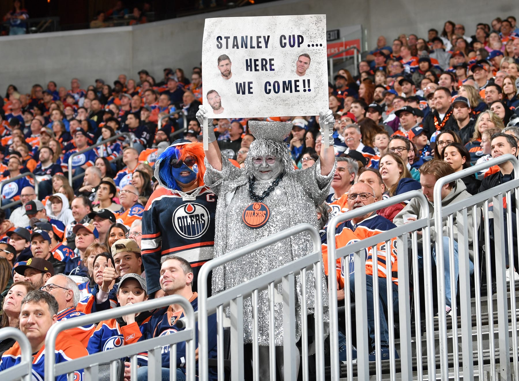 EDMONTON, CANADA - APRIL 13: An Edmonton Oilers fan dressed as a Stanley Cup cheers on the team while holding a sign during the game against the San Jose Sharks on April 13, 2023 at Rogers Place in Edmonton, Alberta, Canada. (Photo by Andy Devlin/NHLI via Getty Images)