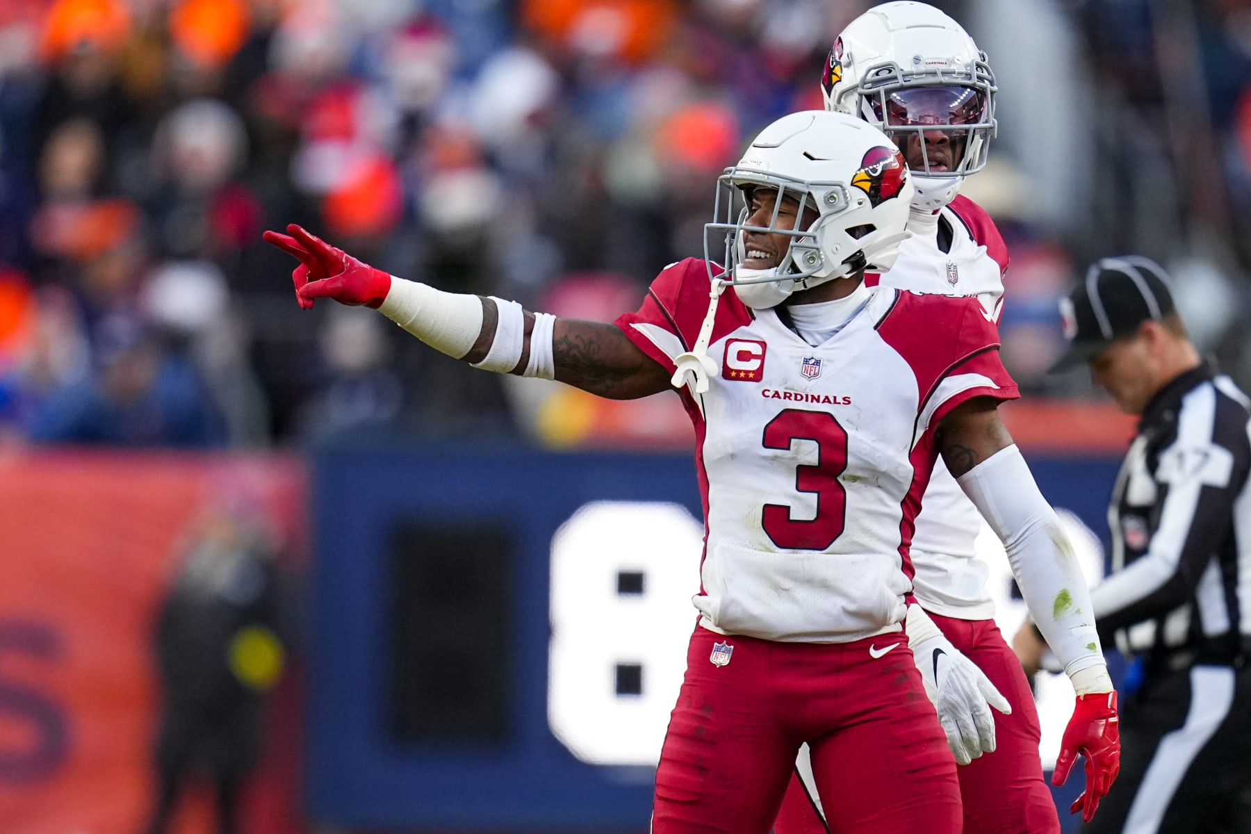 Arizona Cardinals safety Budda Baker (3) signals against the Denver Broncos during the second half of an NFL football game Sunday, Dec. 18, 2022, in Denver. (AP Photo/Jack Dempsey)