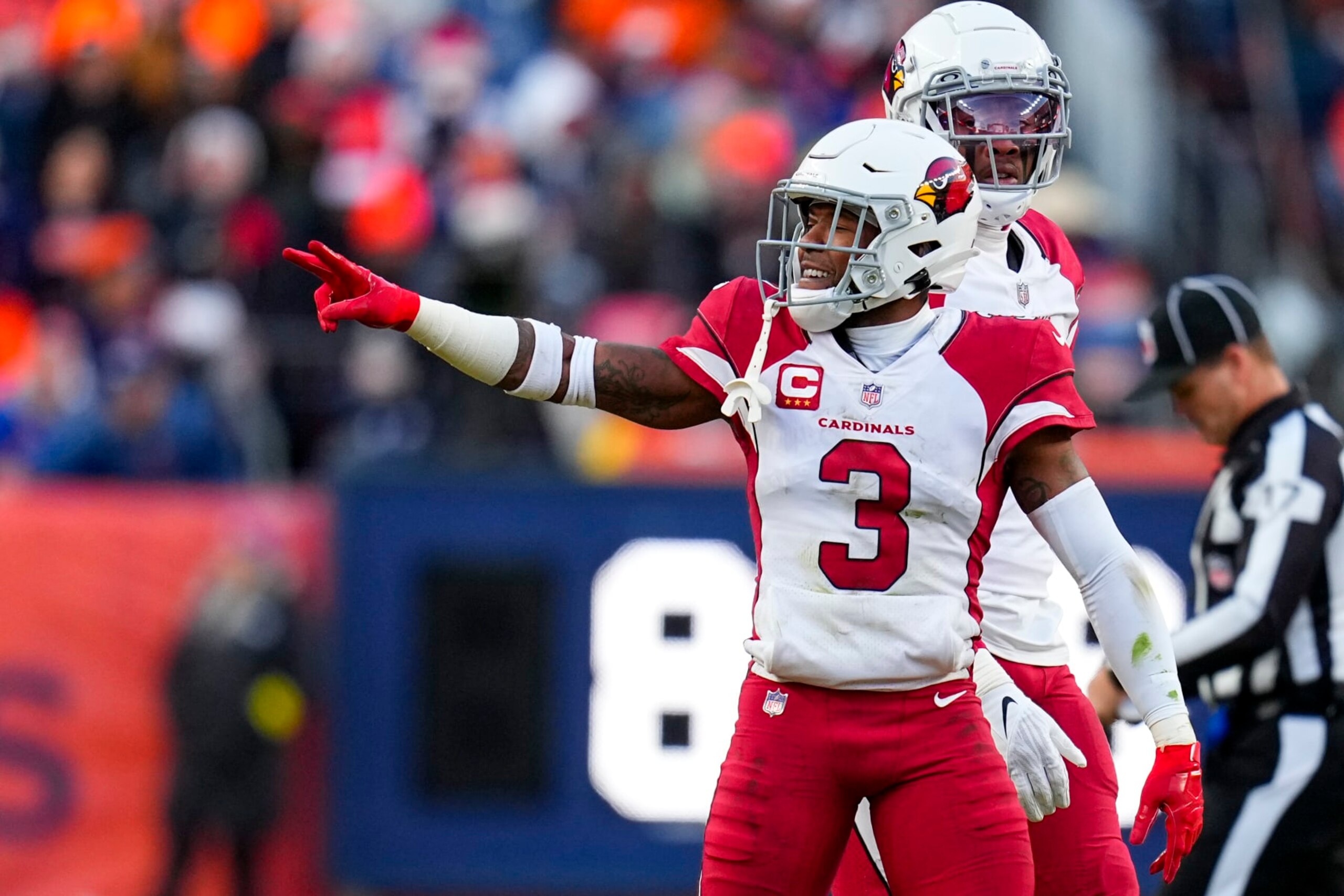 Arizona Cardinals safety Budda Baker (3) signals against the Denver Broncos during the second half of an NFL football game Sunday, Dec. 18, 2022, in Denver. (AP Photo/Jack Dempsey)