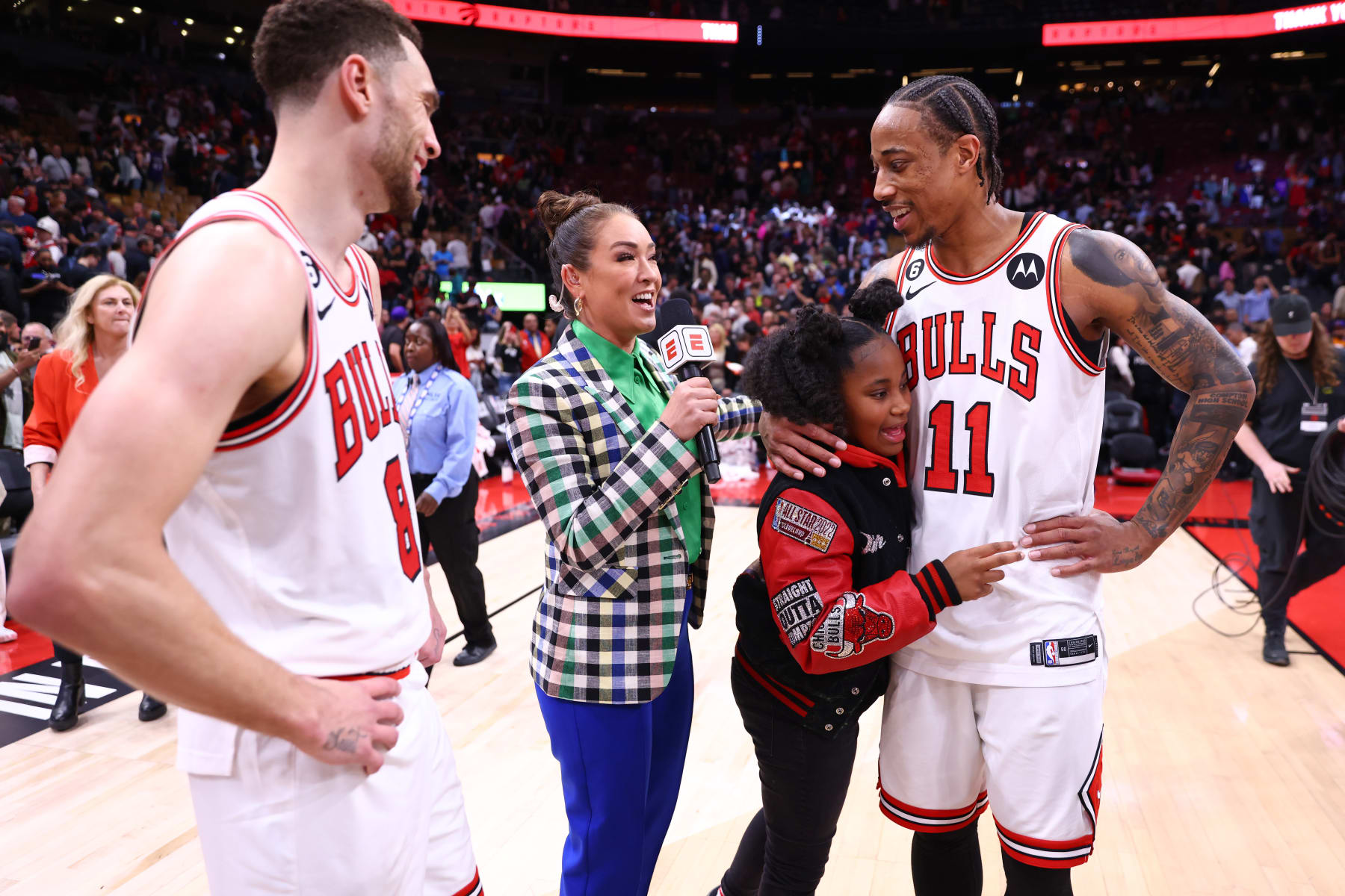 TORONTO, CANADA - APRIL 12: Cassidy Hubbarth interviews Zach LaVine #8 and DeMar DeRozan #11 of the Chicago Bulls and Diar DeRozan after the game against the Toronto Raptors during the 2023 Play-In Tournament on April 12, 2023 at the Scotiabank Arena in Toronto, Ontario, Canada.  NOTE TO USER: User expressly acknowledges and agrees that, by downloading and or using this Photograph, user is consenting to the terms and conditions of the Getty Images License Agreement.  Mandatory Copyright Notice: Copyright 2023 NBAE (Photo by Vaughn Ridley/NBAE via Getty Images)