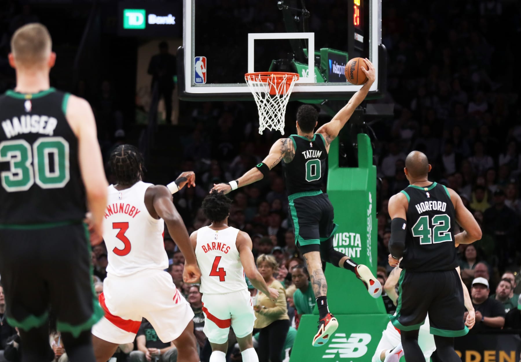 BOSTON, MASSACHUSETTS - APRIL 07: Jayson Tatum #0 of the Boston Celtics dunks during the first quarter of the game against the Toronto Raptors at TD Garden on April 07, 2023 in Boston, Massachusetts. NOTE TO USER: User expressly acknowledges and agrees that, by downloading and or using this photograph, User is consenting to the terms and conditions of the Getty Images License Agreement. (Photo by Omar Rawlings/Getty Images)