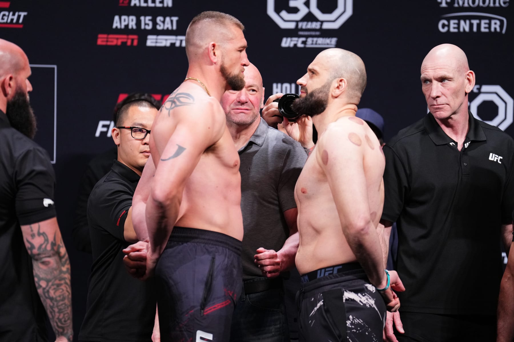 Dustin Jacoby (left) and Azamat Murzakanov (right) at the weigh ins.
