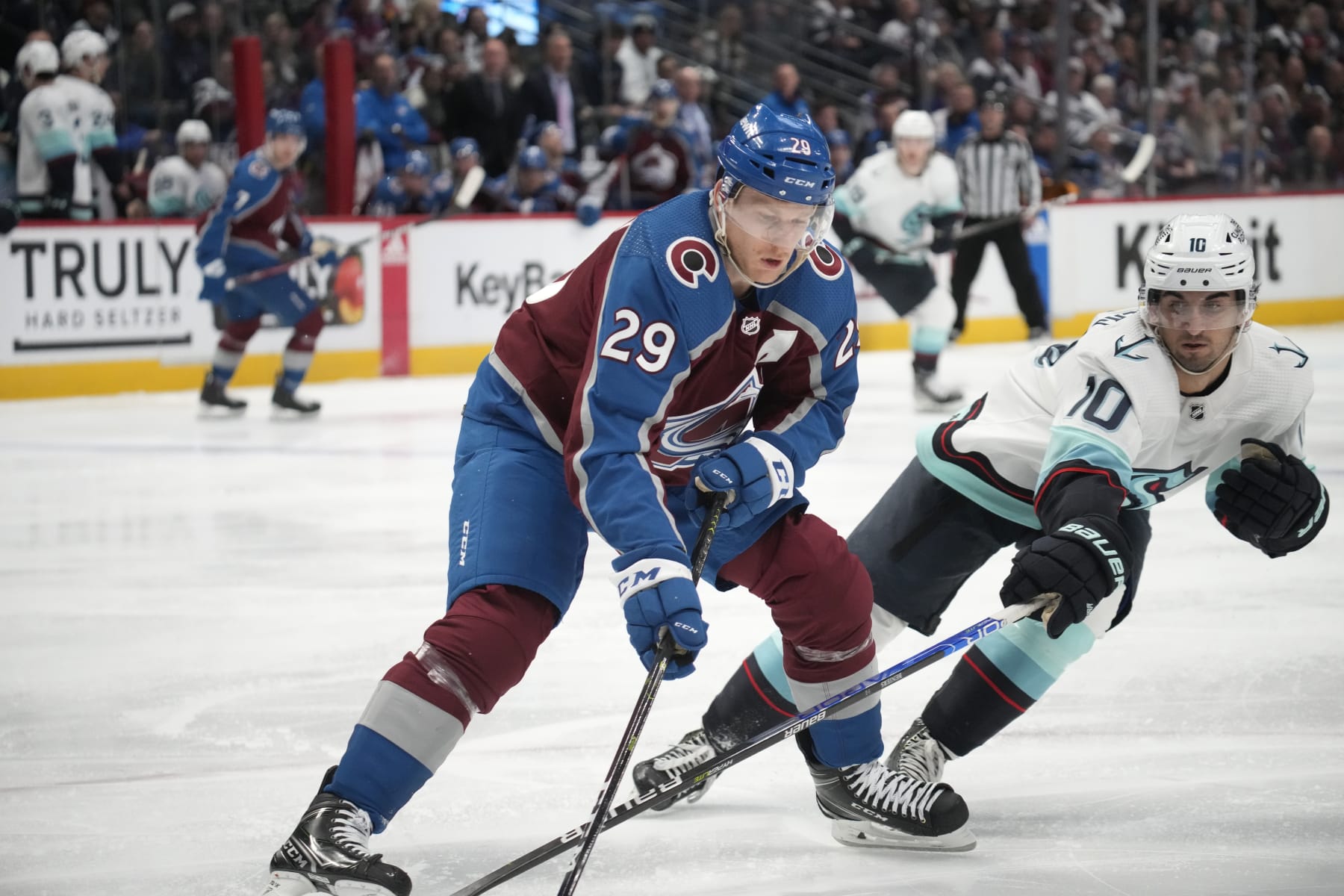 Colorado's Nathan MacKinnon and Seattle's Matty Beniers
