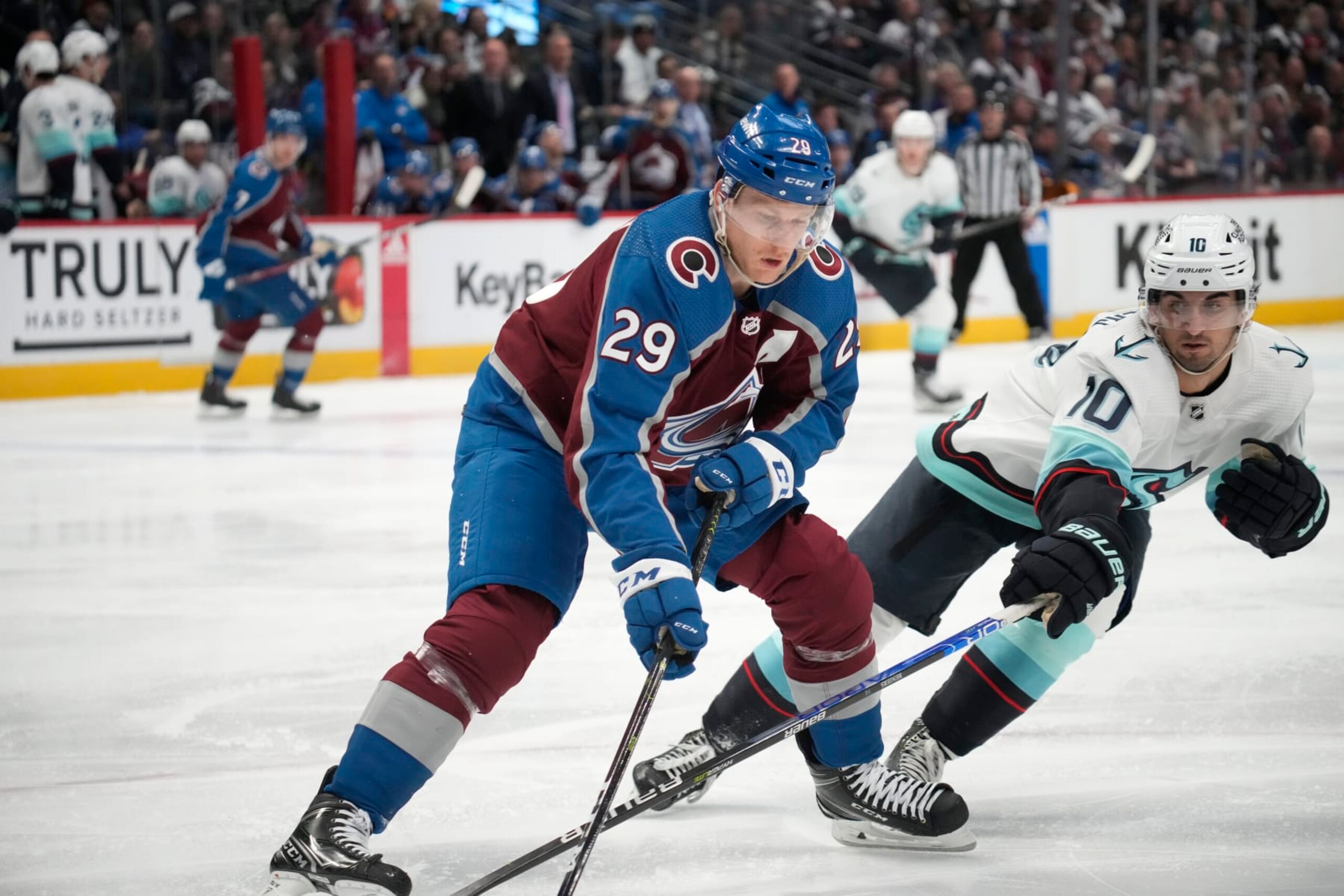 Colorado's Nathan MacKinnon and Seattle's Matty Beniers
