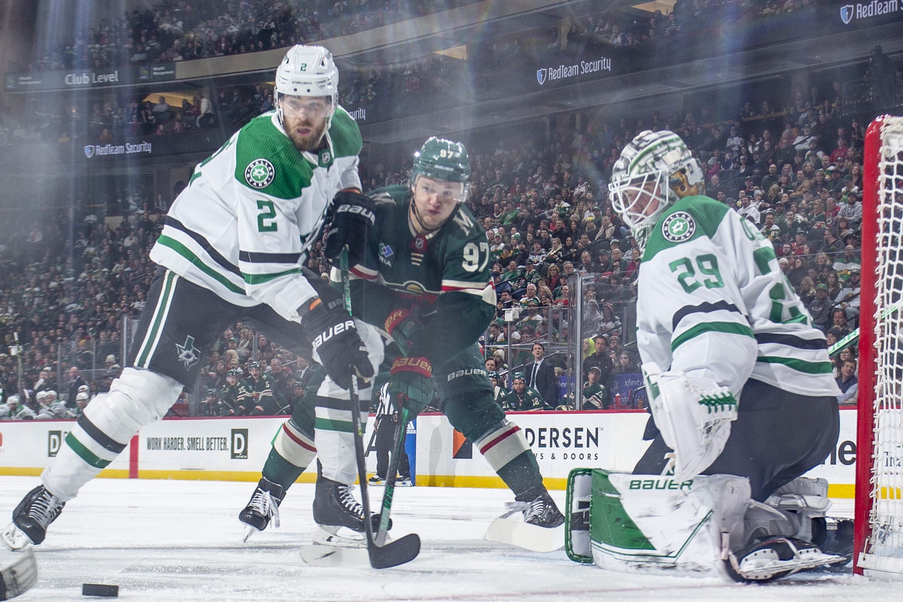 Dallas' Jani Hakanpää (No. 2) and Jake Oettinger (No. 29) defend against Minnesota's Kirill Kaprizov