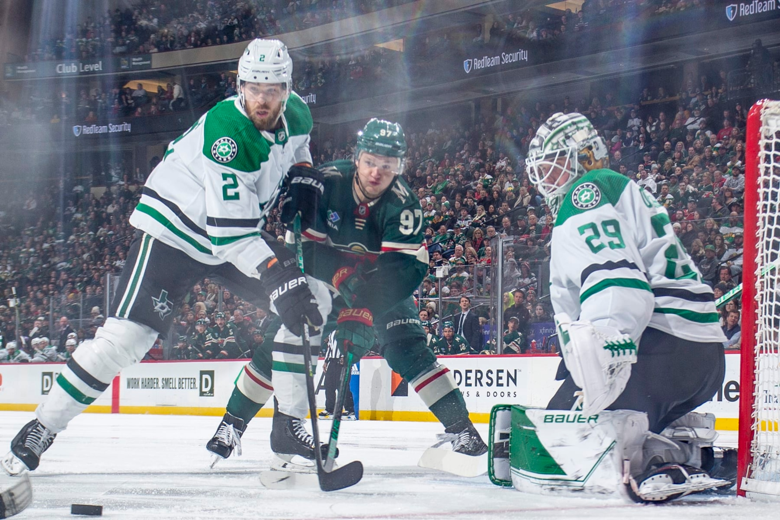 Dallas' Jani Hakanpää (No. 2) and Jake Oettinger (No. 29) defend against Minnesota's Kirill Kaprizov