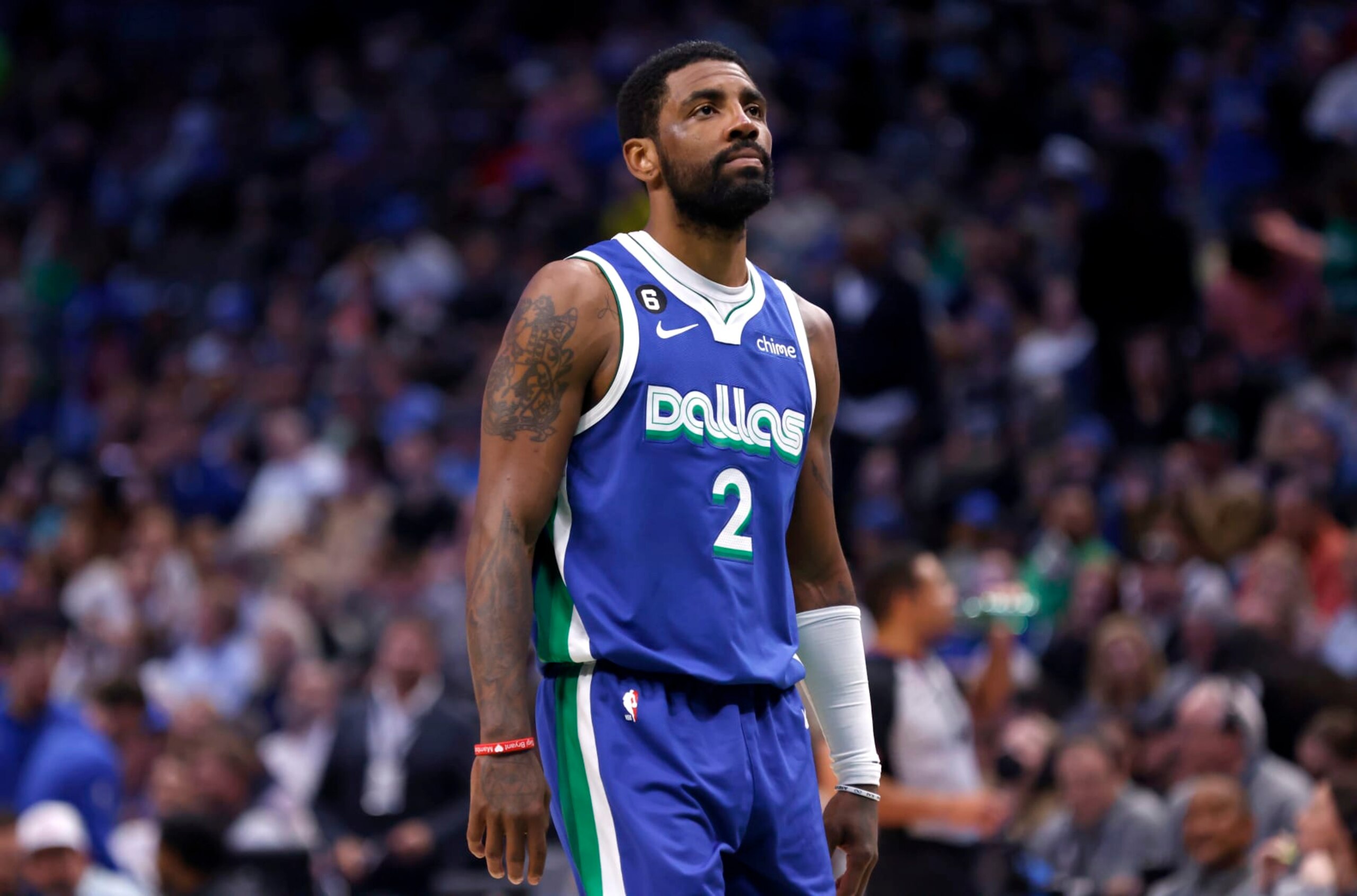 DALLAS, TX - APRIL 5: Kyrie Irving #2 of the Dallas Mavericks looks on as the Mavericks play the Sacramento Kings in the first half at American Airlines Center on April 5, 2023 in Dallas, Texas. NOTE TO USER: User expressly acknowledges and agrees that, by downloading and or using this photograph, User is consenting to the terms and conditions of the Getty Images License Agreement. (Photo by Ron Jenkins/Getty Images)
