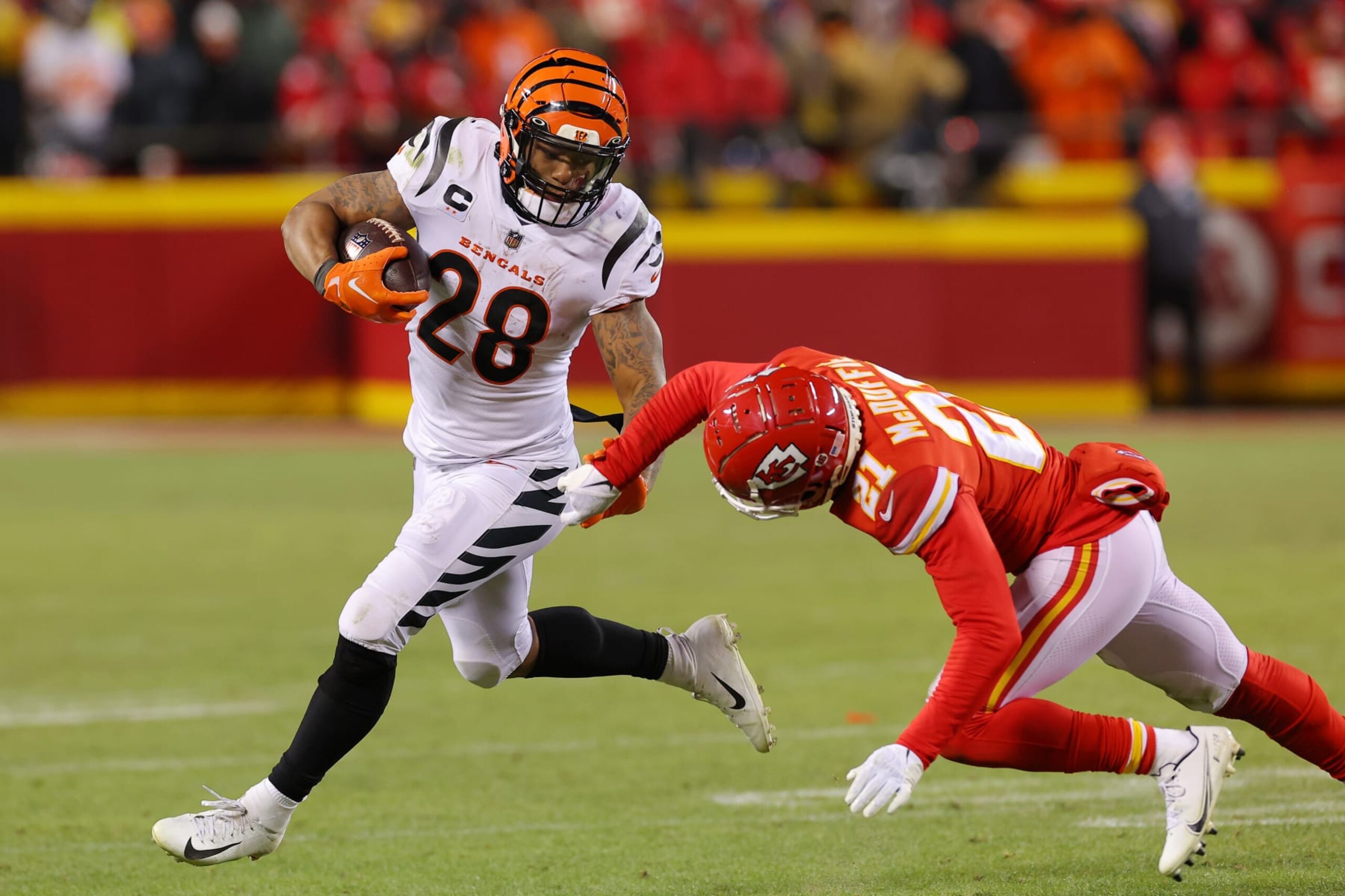 KANSAS CITY, MISSOURI - JANUARY 29: Joe Mixon #28 of the Cincinnati Bengals carries the ball against the Kansas City Chiefs during the third quarter in the AFC Championship Game at GEHA Field at Arrowhead Stadium on January 29, 2023 in Kansas City, Missouri. (Photo by Kevin C. Cox/Getty Images)