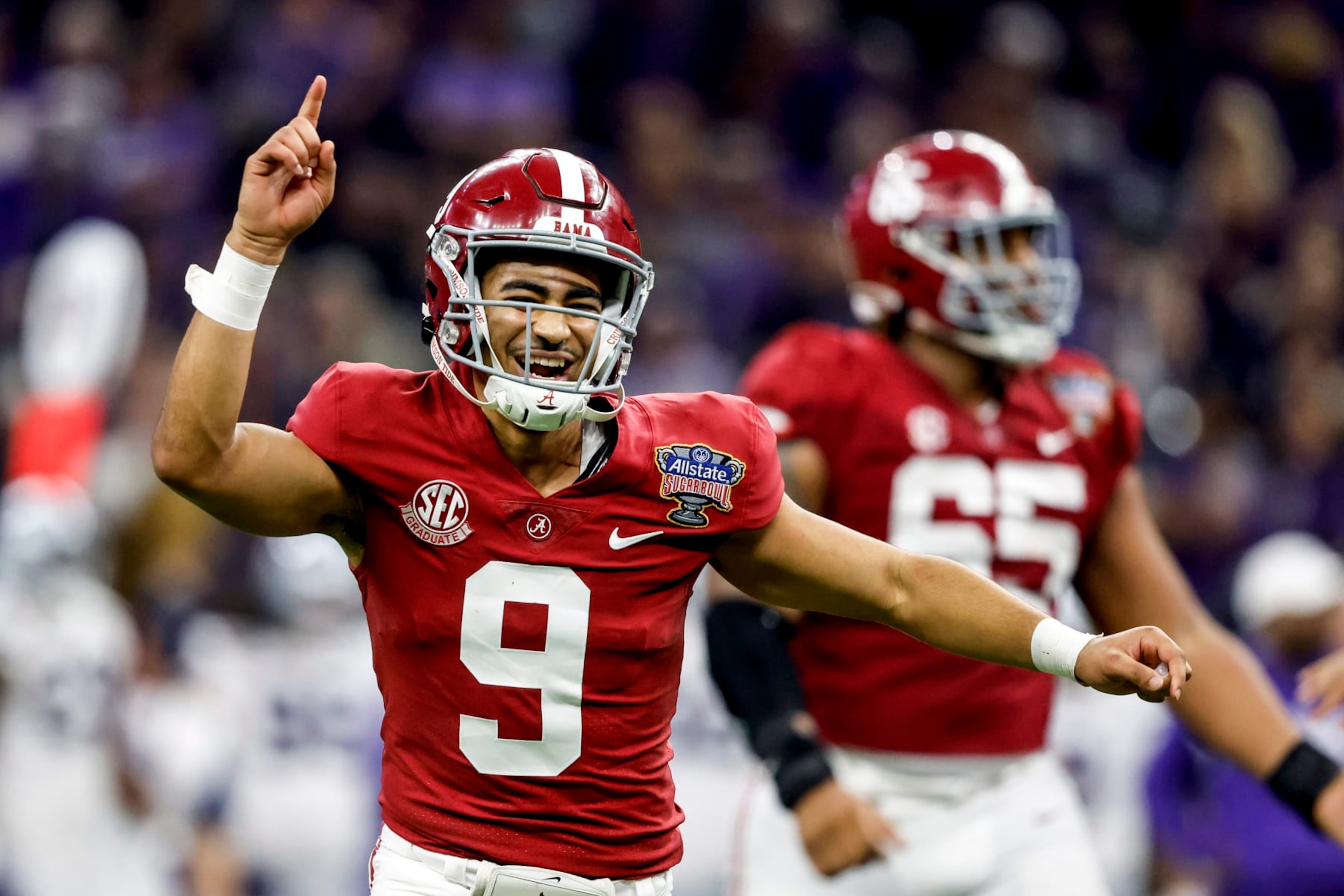 Alabama quarterback Bryce Young (9) celebrates after throwing a touchdown pass during the second half of the Sugar Bowl NCAA college football game against Kansas State, Saturday, Dec. 31, 2022, in New Orleans. (AP Photo/Butch Dill) Alabama quarterback Bryce Young (9) celebrates after throwing a touchdown pass during the second half of the Sugar Bowl NCAA college football game against Kansas State, Saturday, Dec. 31, 2022, in New Orleans. (AP Photo/Butch Dill)
