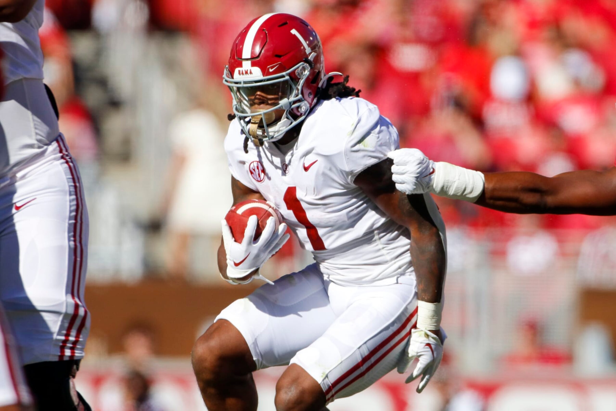 FAYETTEVILLE, AR - OCTOBER 01: Alabama Crimson Tide running back Jahmyr Gibbs (1) carries the football during the college football game between the Alabama Crimson Tide and Arkansas Razorbacks on October 1, 2022, at Donald W. Reynolds Razorback Stadium in Fayetteville, Arkansas. (Photo by Andy Altenburger/Icon Sportswire via Getty Images)
