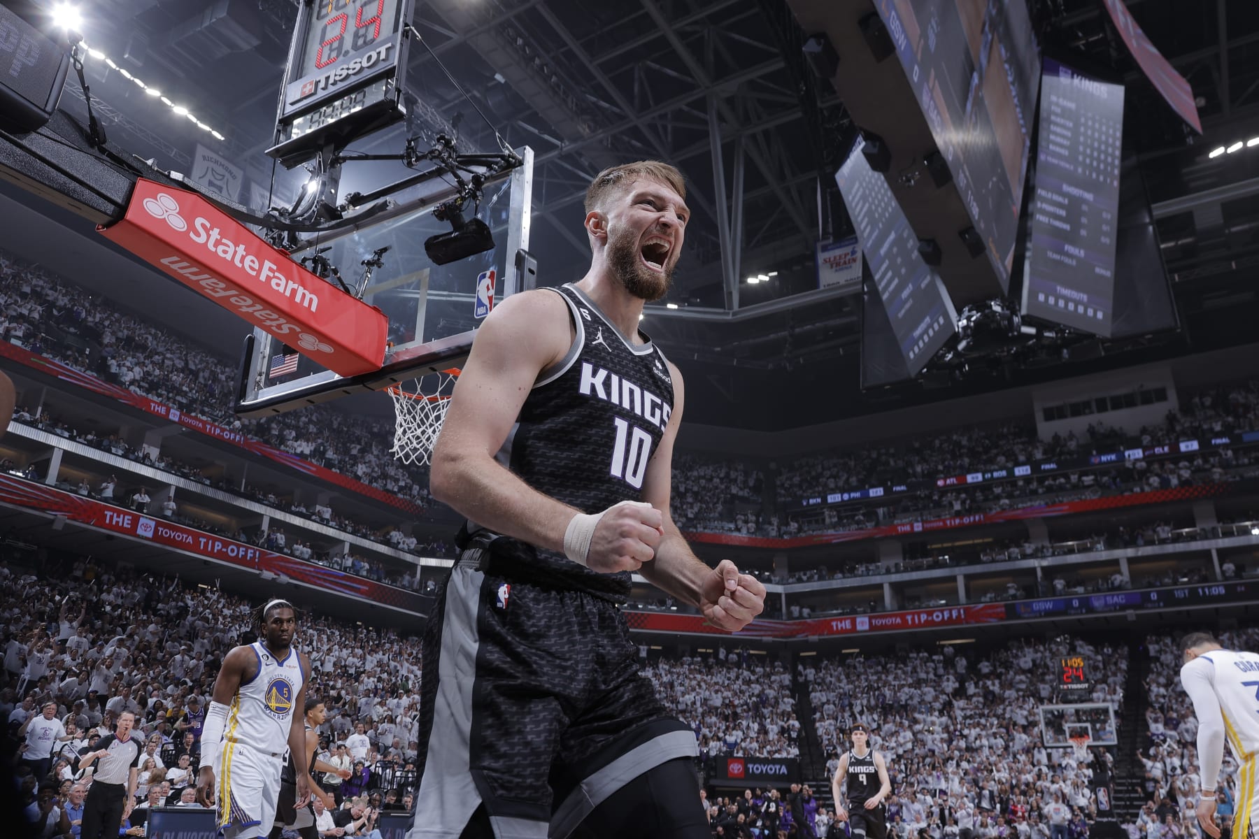 SACRAMENTO, CA - APRIL 15: Domantas Sabonis #10 of the Sacramento Kings celebrates a play during Round One Game One of the 2023 NBA Playoffs against the Golden State Warriors on April 15, 2023 at Golden 1 Center in Sacramento, California. NOTE TO USER: User expressly acknowledges and agrees that, by downloading and or using this Photograph, user is consenting to the terms and conditions of the Getty Images License Agreement. Mandatory Copyright Notice: Copyright 2023 NBAE (Photo by Rocky Widner/NBAE via Getty Images)