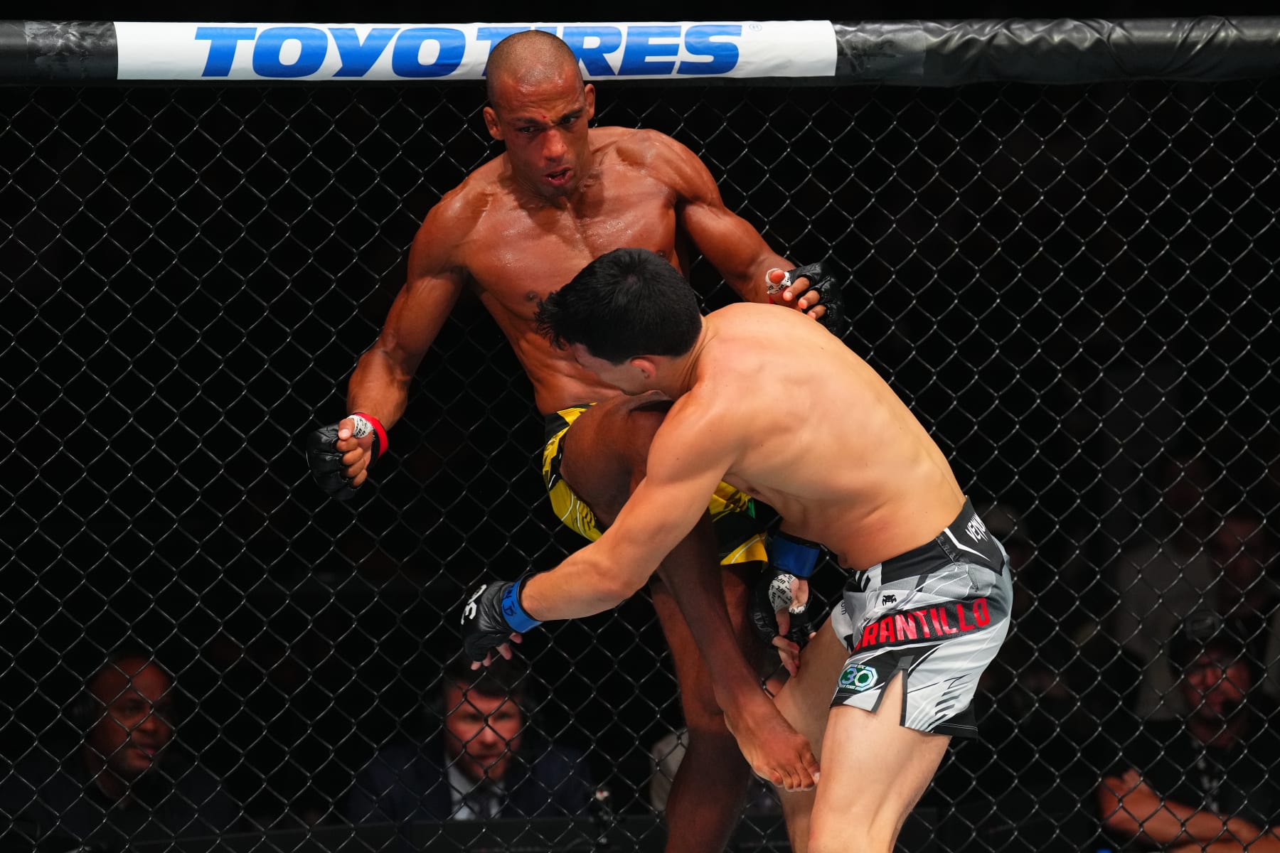 KANSAS CITY, MISSOURI - APRIL 15: (L-R) Edson Barboza of Brazil lands a knee to the chin of Billy Quarantillo in a featherweight fight during the UFC Fight Night event at T-Mobile Center on April 15, 2023 in Kansas City, Missouri. (Photo by Josh Hedges/Zuffa LLC via Getty Images)