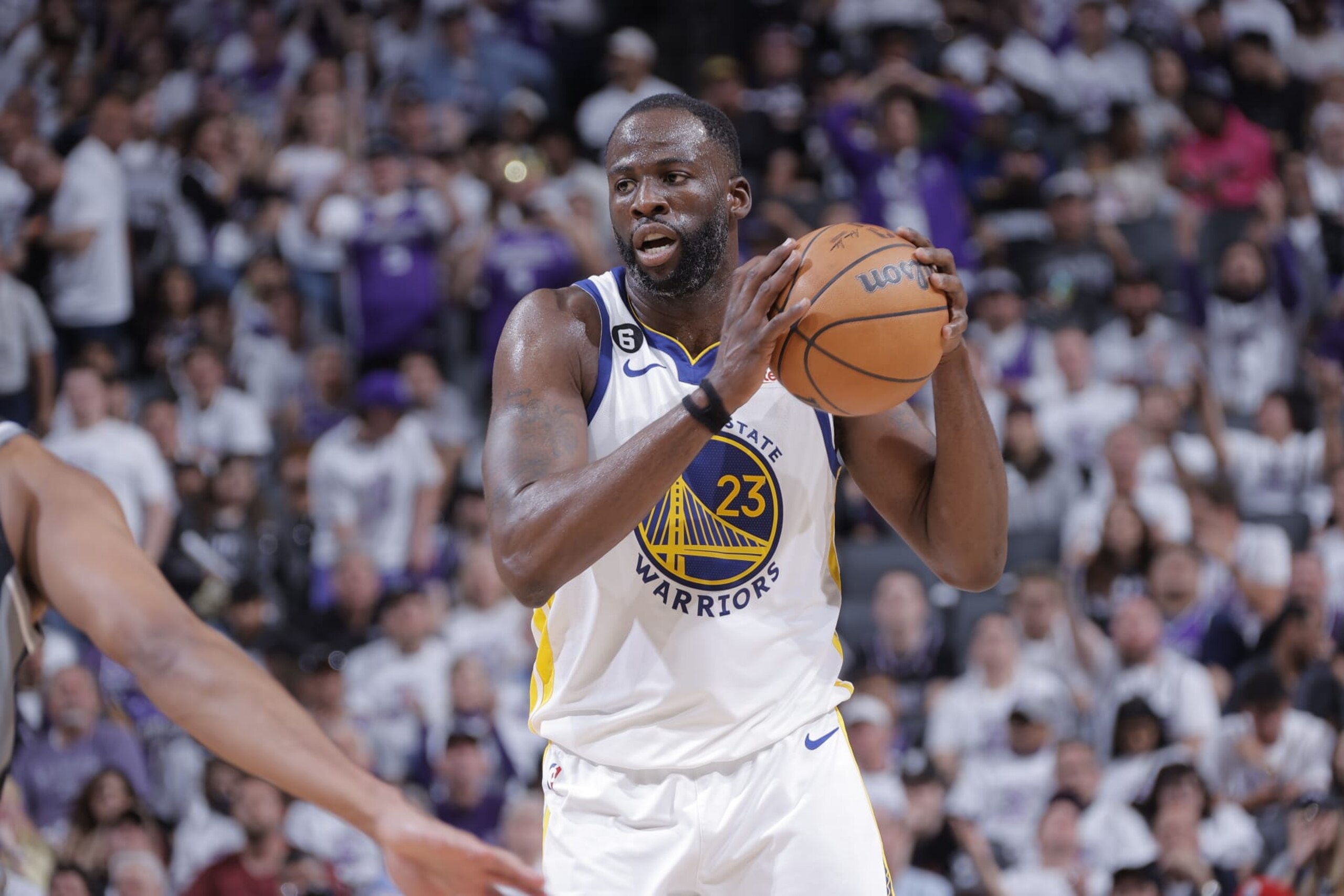 SACRAMENTO, CA - APRIL 15: Draymond Green #23 of the Golden State Warriors handles the ball during Round One Game One of the 2023 NBA Playoffs on April 15, 2023 at Golden 1 Center in Sacramento, California. NOTE TO USER: User expressly acknowledges and agrees that, by downloading and or using this Photograph, user is consenting to the terms and conditions of the Getty Images License Agreement. Mandatory Copyright Notice: Copyright 2023 NBAE (Photo by Rocky Widner/NBAE via Getty Images)