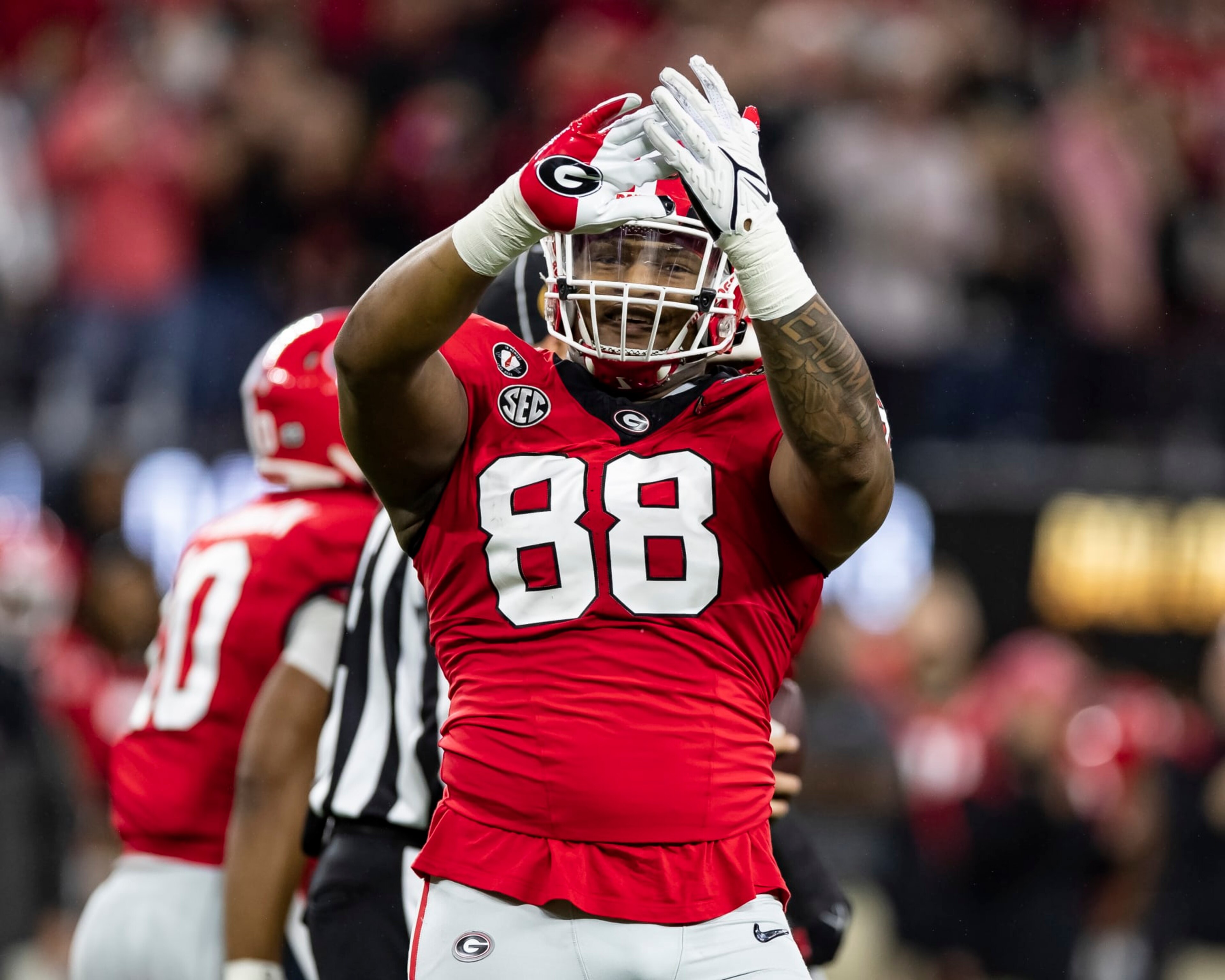 INGLEWOOD, CA - JANUARY 9: Jalen Carter #88 of the Georgia Bulldogs celebrates a big defensive play during a game between Texas Christian Horned Frogs and Georgia Bulldogs at SoFi Stadium on January 9, 2023 in Inglewood, California. (Photo by Steve Limentani/ISI Photos/Getty Images) INGLEWOOD, CA - JANUARY 9: Jalen Carter #88 of the Georgia Bulldogs celebrates a big defensive play during a game between Texas Christian Horned Frogs and Georgia Bulldogs at SoFi Stadium on January 9, 2023 in Inglewood, California. (Photo by Steve Limentani/ISI Photos/Getty Images)