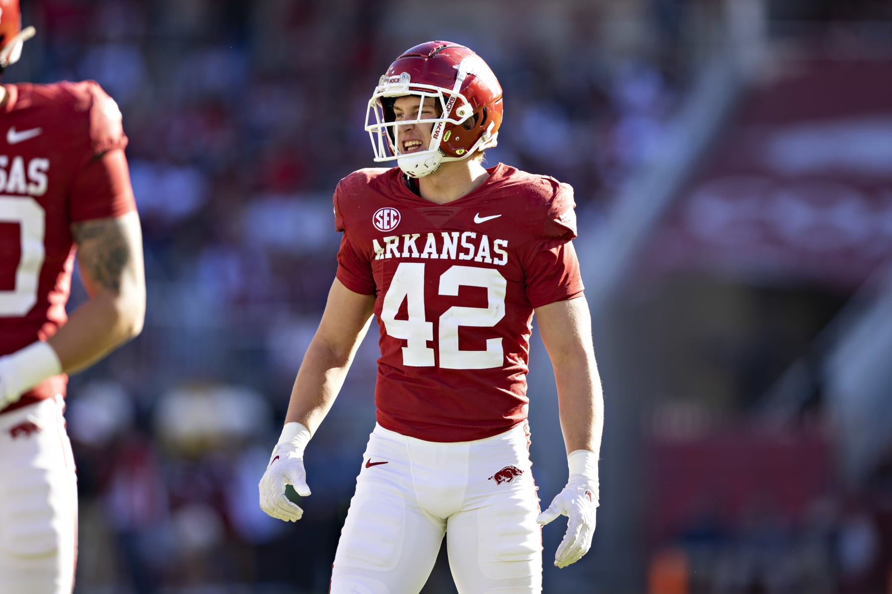 FAYETTEVILLE, ARKANSAS - NOVEMBER 05: Drew Sanders #42 of the Arkansas Razorbacks looks over the offense during a game against the Liberty Flames at Donald W. Reynolds Razorback Stadium on November 5, 2022 in Fayetteville, Arkansas. The Flames defeated the Razorbacks 21-19.  (Photo by Wesley Hitt/Getty Images)