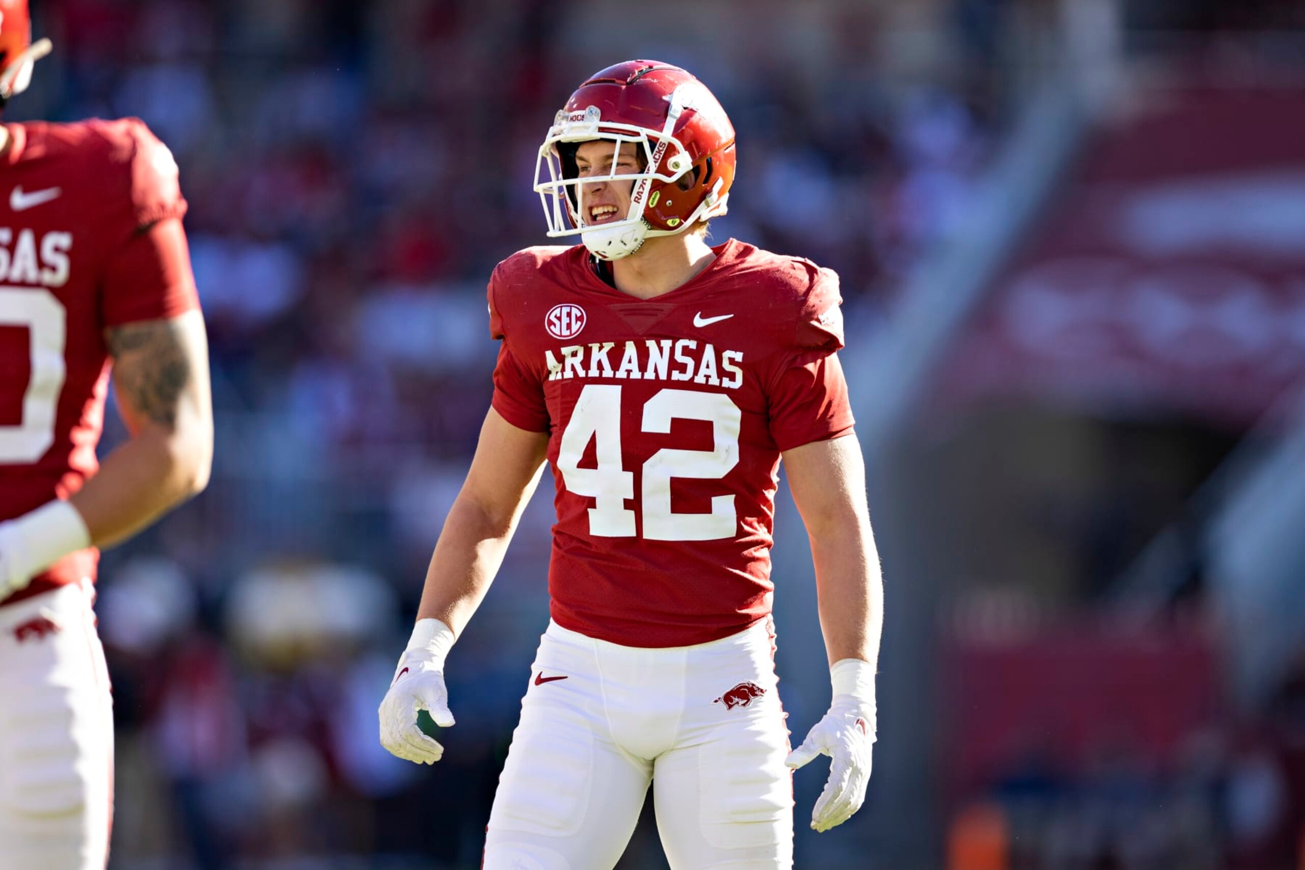 FAYETTEVILLE, ARKANSAS - NOVEMBER 05: Drew Sanders #42 of the Arkansas Razorbacks looks over the offense during a game against the Liberty Flames at Donald W. Reynolds Razorback Stadium on November 5, 2022 in Fayetteville, Arkansas. The Flames defeated the Razorbacks 21-19.  (Photo by Wesley Hitt/Getty Images)