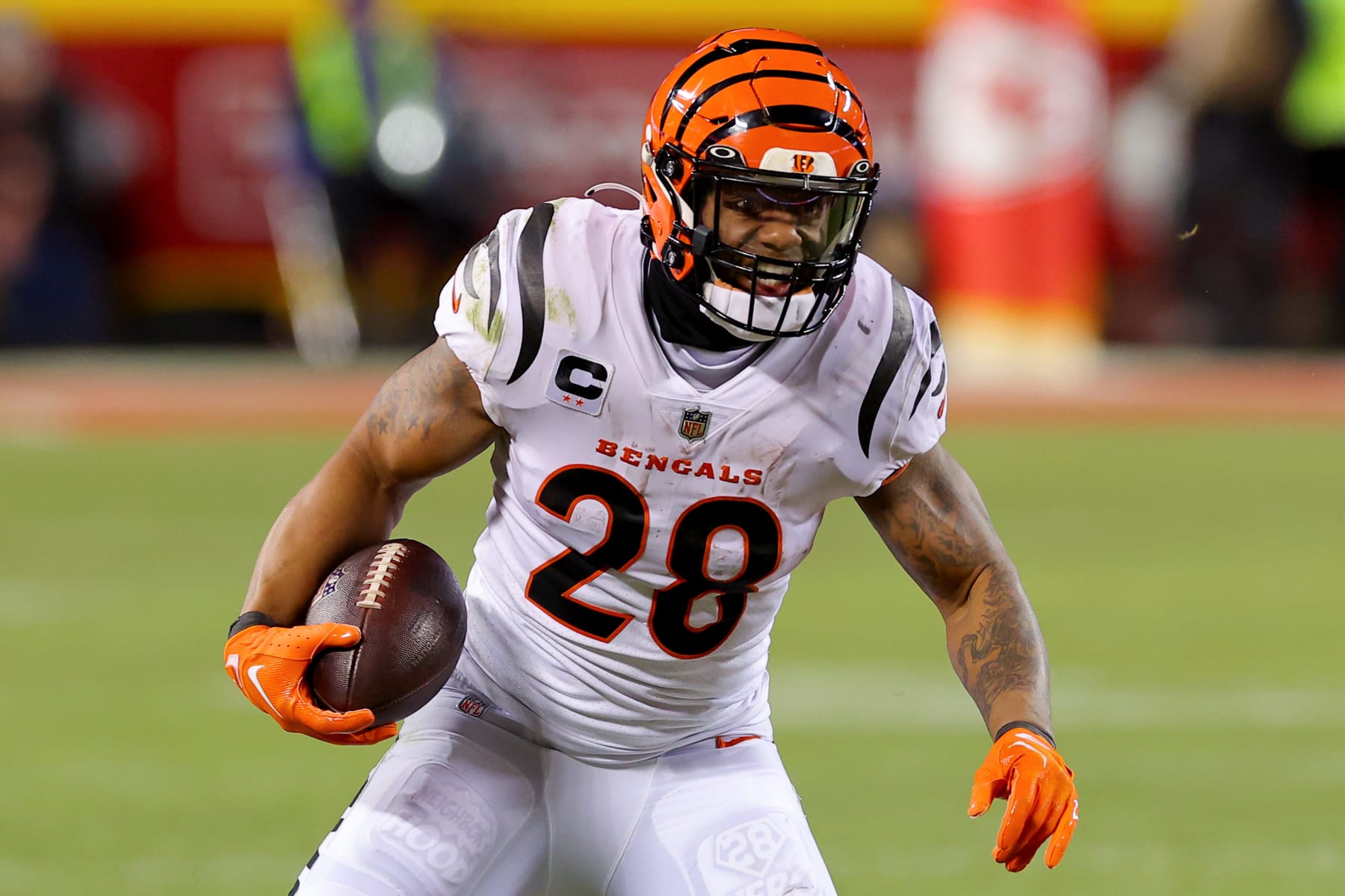 KANSAS CITY, MISSOURI - JANUARY 29: Joe Mixon #28 of the Cincinnati Bengals carries the ball against the Kansas City Chiefs during the third quarter in the AFC Championship Game at GEHA Field at Arrowhead Stadium on January 29, 2023 in Kansas City, Missouri. (Photo by Kevin C. Cox/Getty Images)