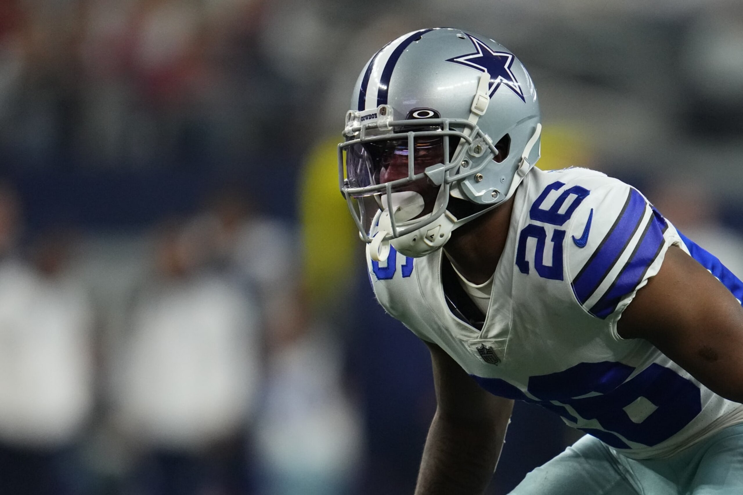 ARLINGTON, TEXAS - JANUARY 16: Jourdan Lewis #26 of the Dallas Cowboys gets set against the San Francisco 49ers during an NFL wild-card playoff football game at AT&T Stadium on January 16, 2022 in Arlington, Texas. (Photo by Cooper Neill/Getty Images) ARLINGTON, TEXAS - JANUARY 16: Jourdan Lewis #26 of the Dallas Cowboys gets set against the San Francisco 49ers during an NFL wild-card playoff football game at AT&T Stadium on January 16, 2022 in Arlington, Texas. (Photo by Cooper Neill/Getty Images)