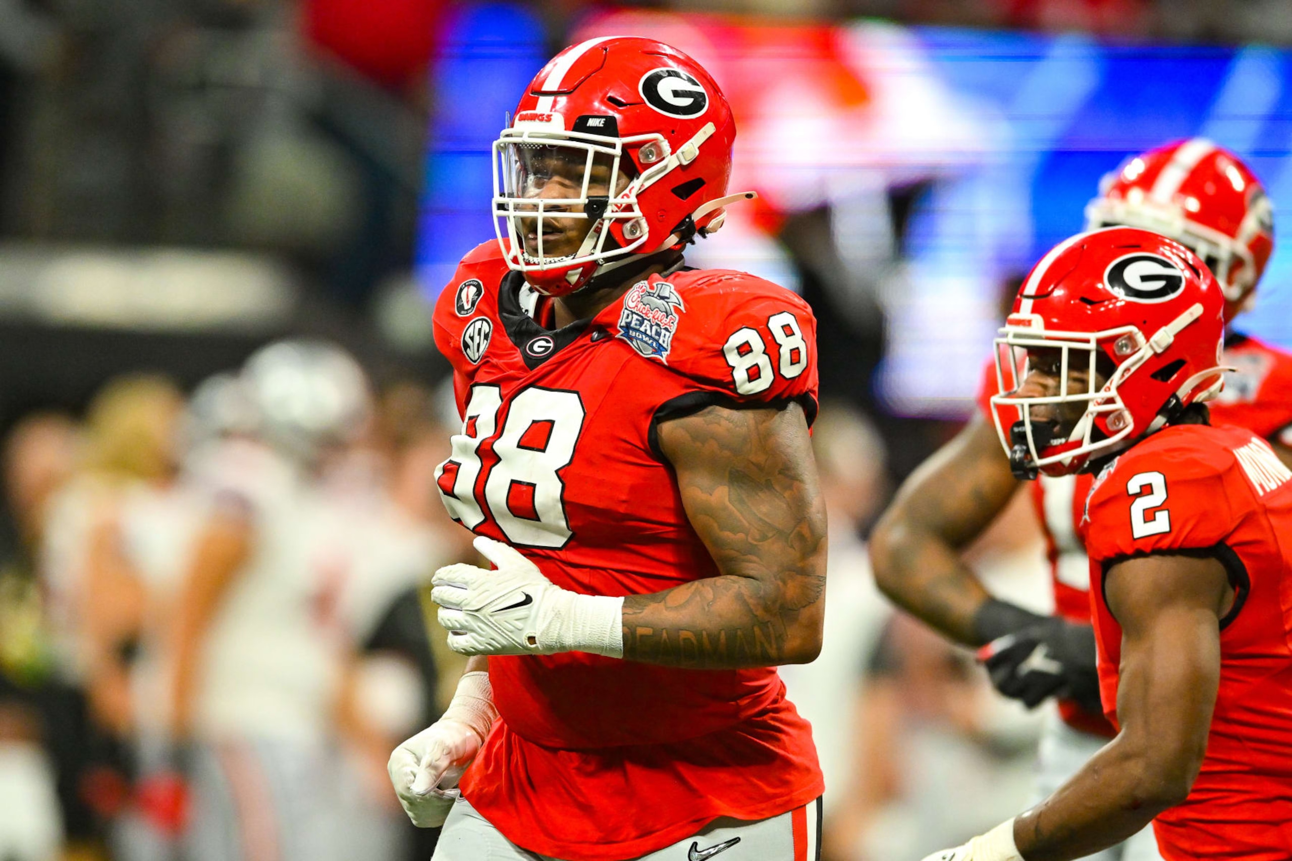 ATLANTA, GA  DECEMBER 31:  Georgia defensive lineman Jalen Carter (88) reacts after a defensive stop during the Chick-fil-A Peach Bowl college football playoff game between the Ohio State Buckeyes and the Georgia Bulldogs on December 31st, 2022 at Mercedes-Benz Stadium in Atlanta, GA.  (Photo by Rich von Biberstein/Icon Sportswire via Getty Images)