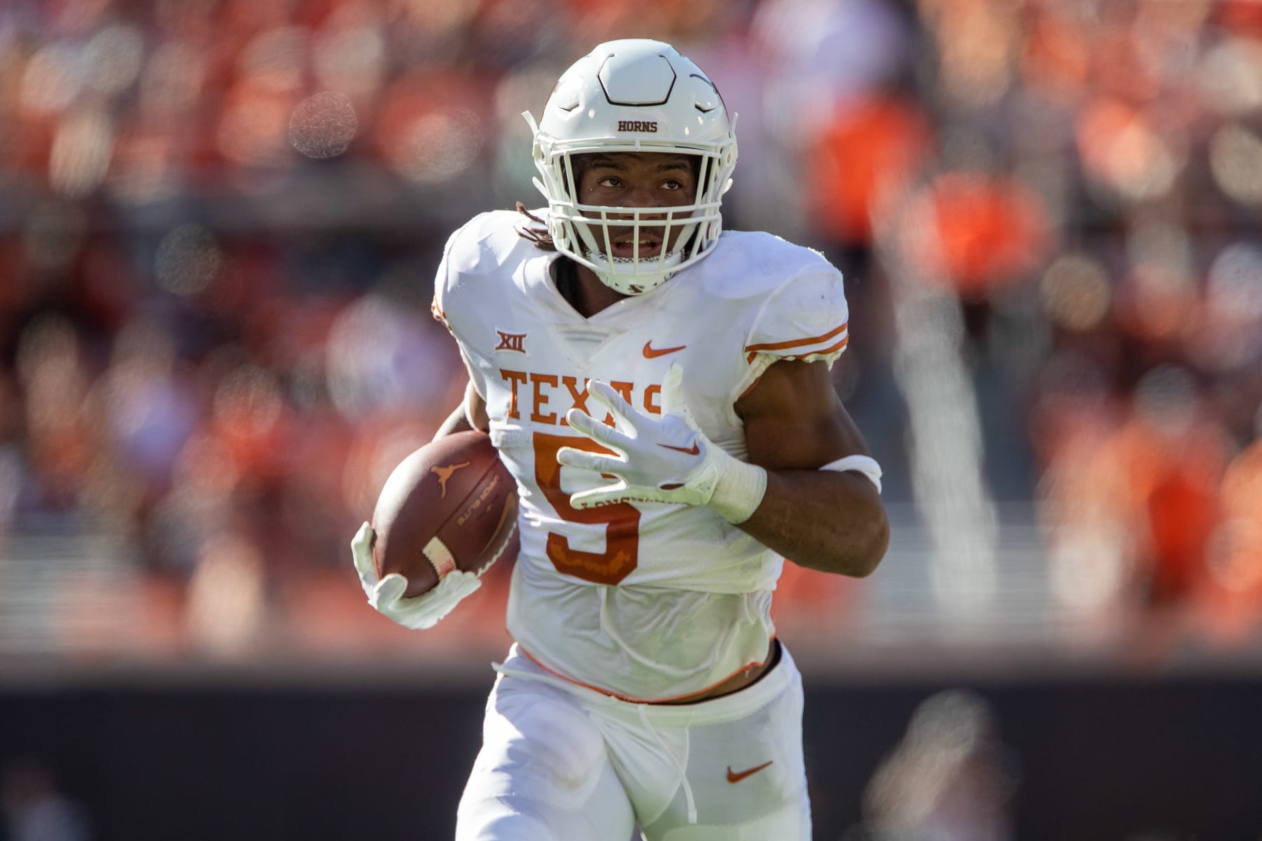 STILLWATER, OK - OCTOBER 22: Texas Longhorns running back Bijan Robinson (5) heads to the end zone for a touchdown during the first half against the Oklahoma State Cowboys on October 22nd, 2022 at Boone Pickens Stadium in Stillwater, Oklahoma. (Photo by William Purnell/Icon Sportswire via Getty Images)