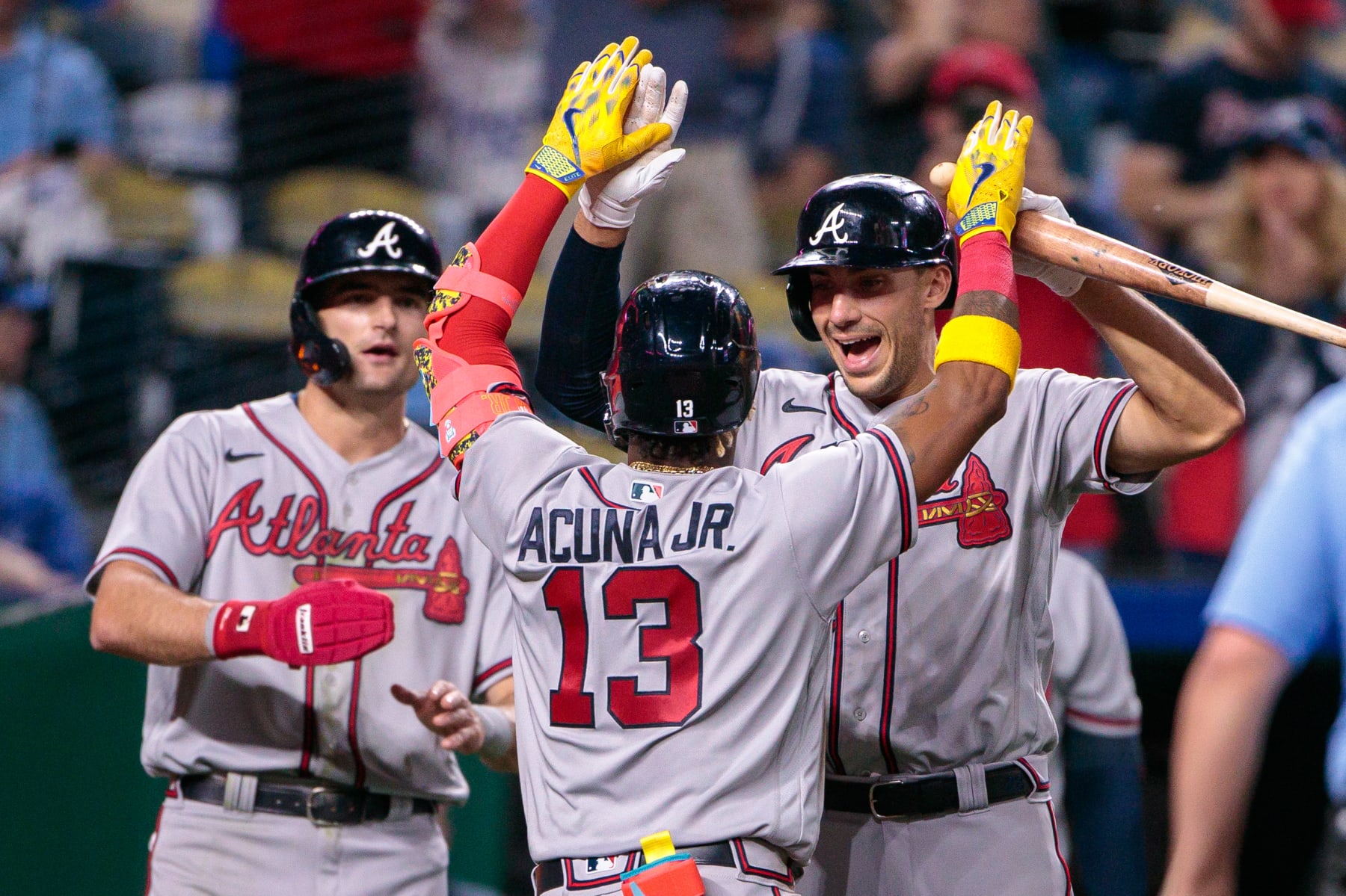 KANSAS CITY, MO - APRIL 14: Atlanta Braves right fielder Ronald Acuna Jr. (13) slaps hands with teammates after scoring against the Kansas City Royals on April 14th at Kauffman Stadium in Kansas City, Missouri. (Photo by William Purnell/Icon Sportswire via Getty Images)