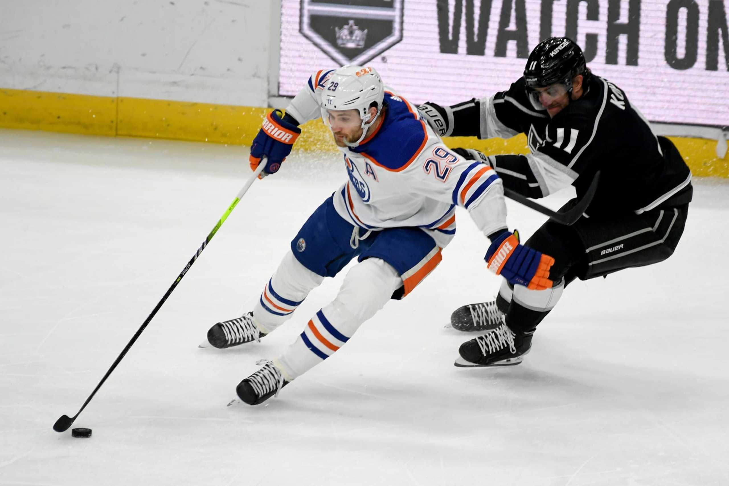 Edmonton Oilers forward Leon Draisaitl (left) and Los Angeles Kings captain Anze Kopitar.