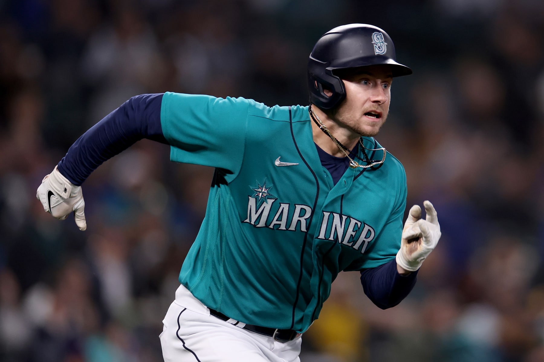 SEATTLE, WASHINGTON - APRIL 14: Jarred Kelenic #10 of the Seattle Mariners doubles during the fourth inning against the Colorado Rockies at T-Mobile Park on April 14, 2023 in Seattle, Washington. (Photo by Steph Chambers/Getty Images)
