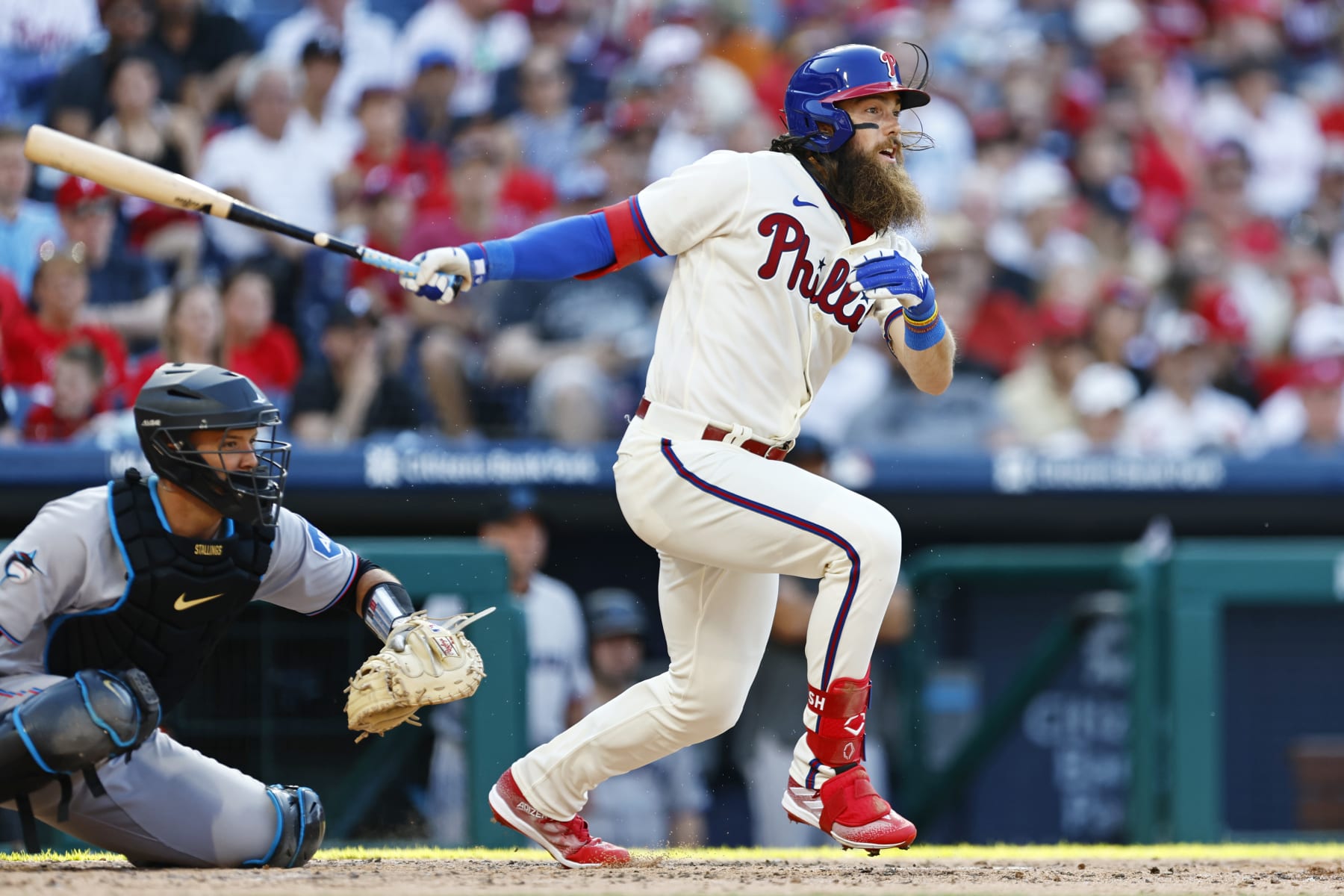 PHILADELPHIA, PA - APRIL 12: Brandon Marsh #16 of the Philadelphia Phillies hits an RBI single against the Miami Marlins during the fourth inning of a game at Citizens Bank Park on April 12, 2023 in Philadelphia, Pennsylvania. (Photo by Rich Schultz/Getty Images)