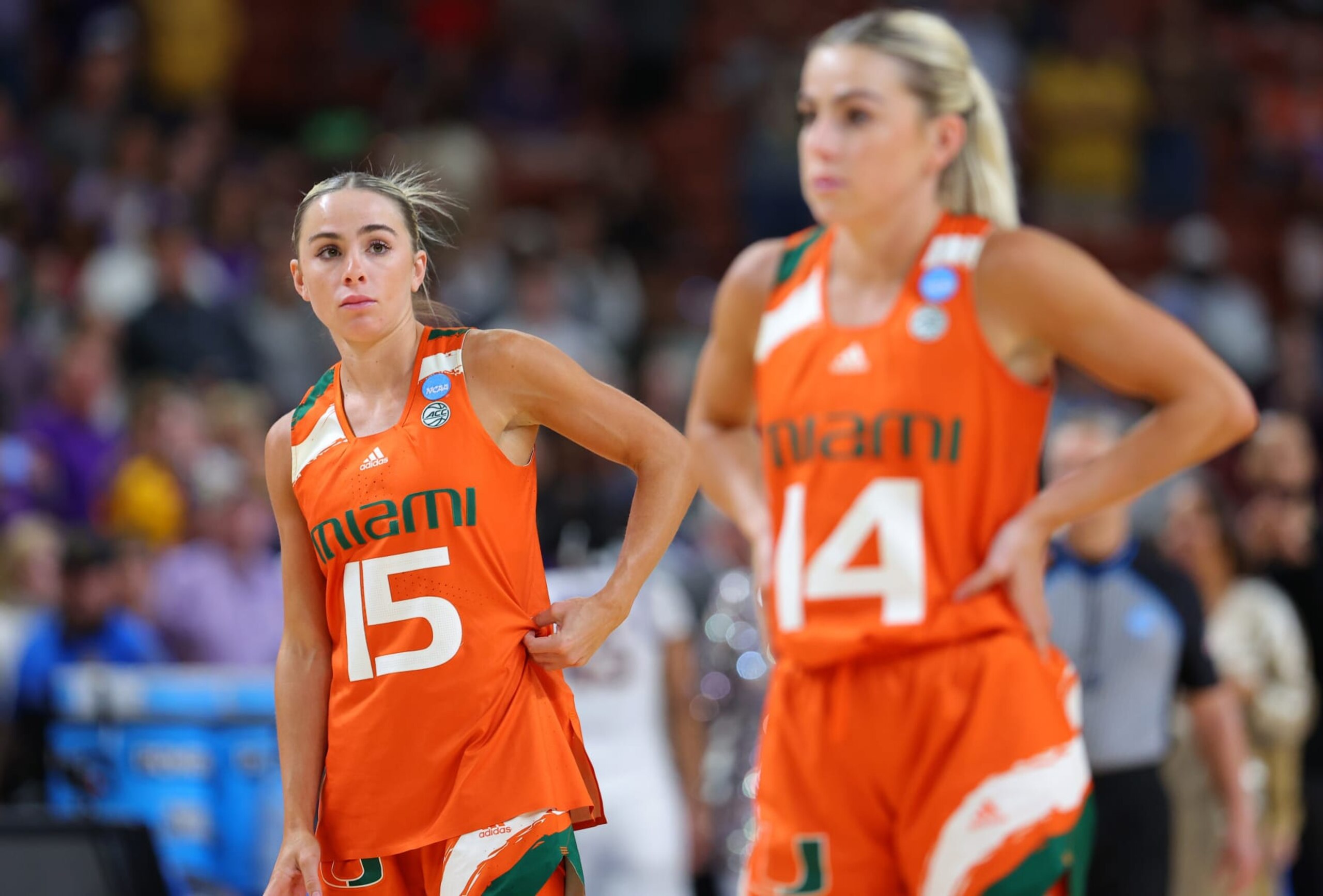 GREENVILLE, SOUTH CAROLINA - MARCH 26: Hanna Cavinder #15 and Haley Cavinder #14 of the Miami Hurricanes react during the fourth quarter of the game against the LSU Lady Tigers in the Elite Eight round of the NCAA Women's Basketball Tournament at Bon Secours Wellness Arena on March 26, 2023 in Greenville, South Carolina. (Photo by Kevin C. Cox/Getty Images) GREENVILLE, SOUTH CAROLINA - MARCH 26: Hanna Cavinder #15 and Haley Cavinder #14 of the Miami Hurricanes react during the fourth quarter of the game against the LSU Lady Tigers in the Elite Eight round of the NCAA Women's Basketball Tournament at Bon Secours Wellness Arena on March 26, 2023 in Greenville, South Carolina. (Photo by Kevin C. Cox/Getty Images)