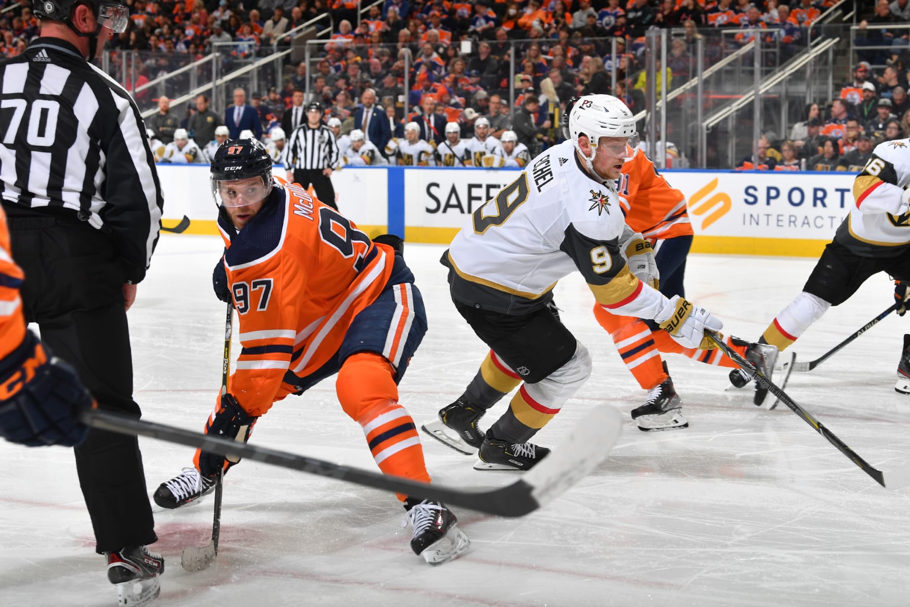 EDMONTON, AB - APRIL 16: Connor McDavid #97 of the Edmonton Oilers battles for the puck against Jack Eichel #9 of the Vegas Golden Knights on April 16, 2022 at Rogers Place in Edmonton, Alberta, Canada. (Photo by Andy Devlin/NHLI via Getty Images)